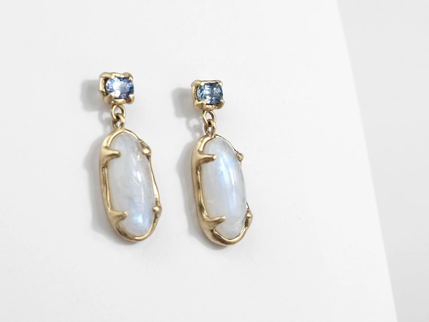 14k gold earrings with top sapphire stone and hanging moonstone by Sara Golden Jewelry
