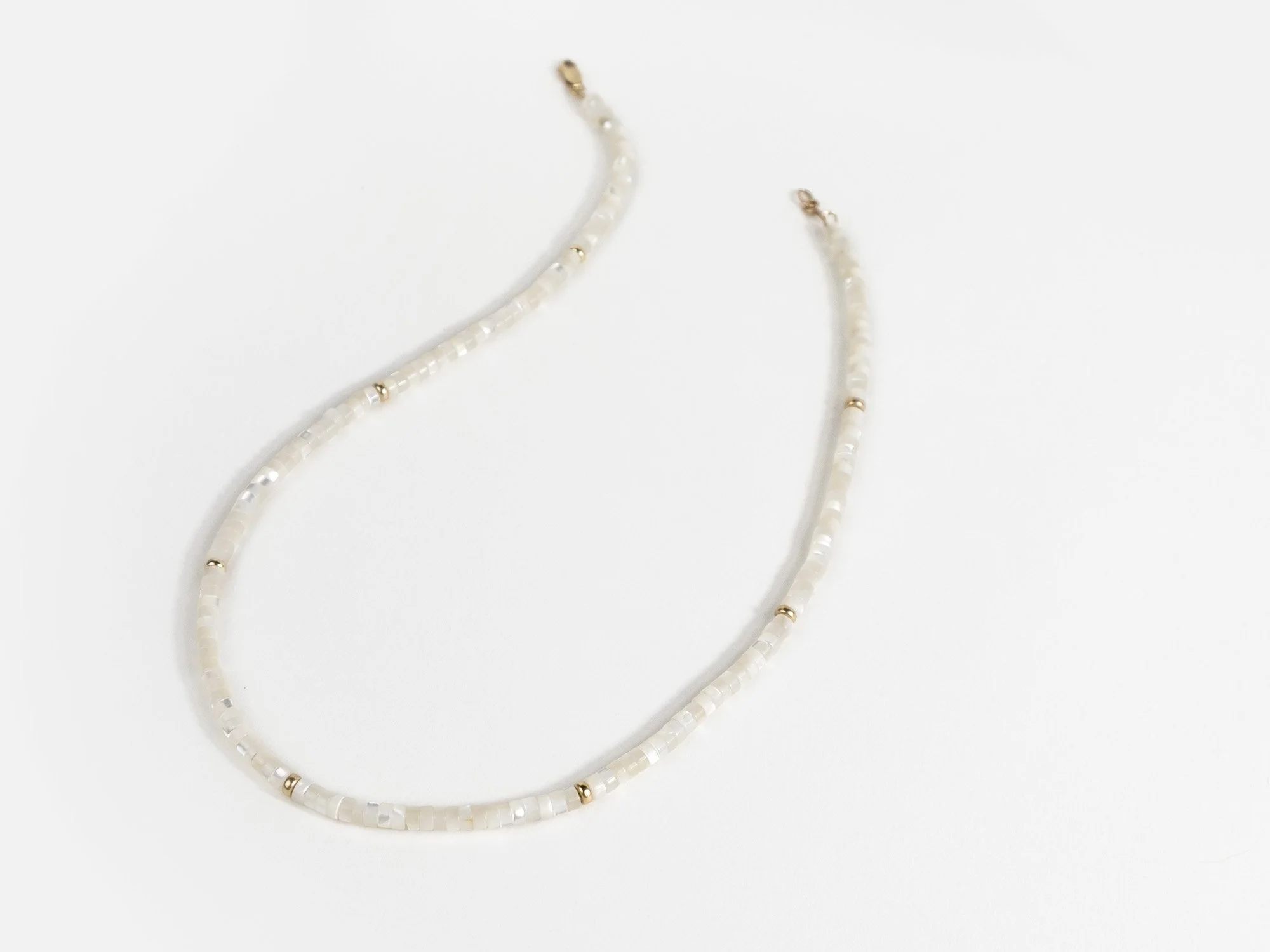 Necklace with mother-of-pearl and gold beads by Sara Golden Jewelry