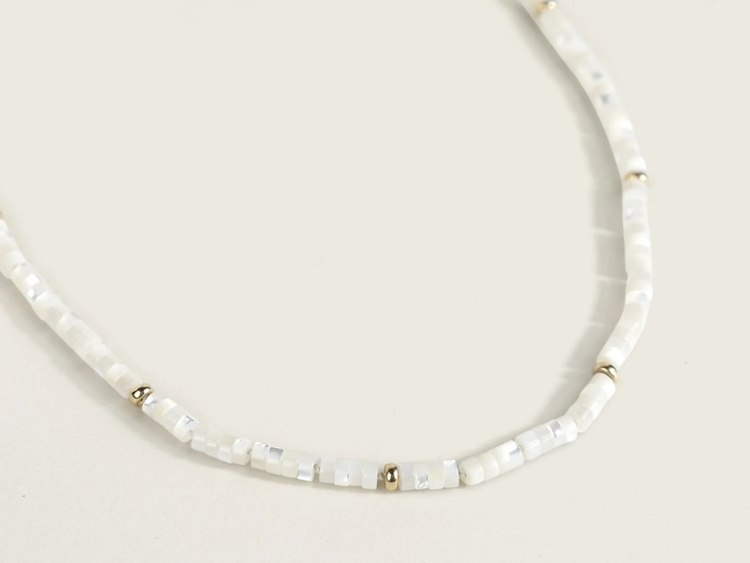 Mother of pearl and gold bead necklace