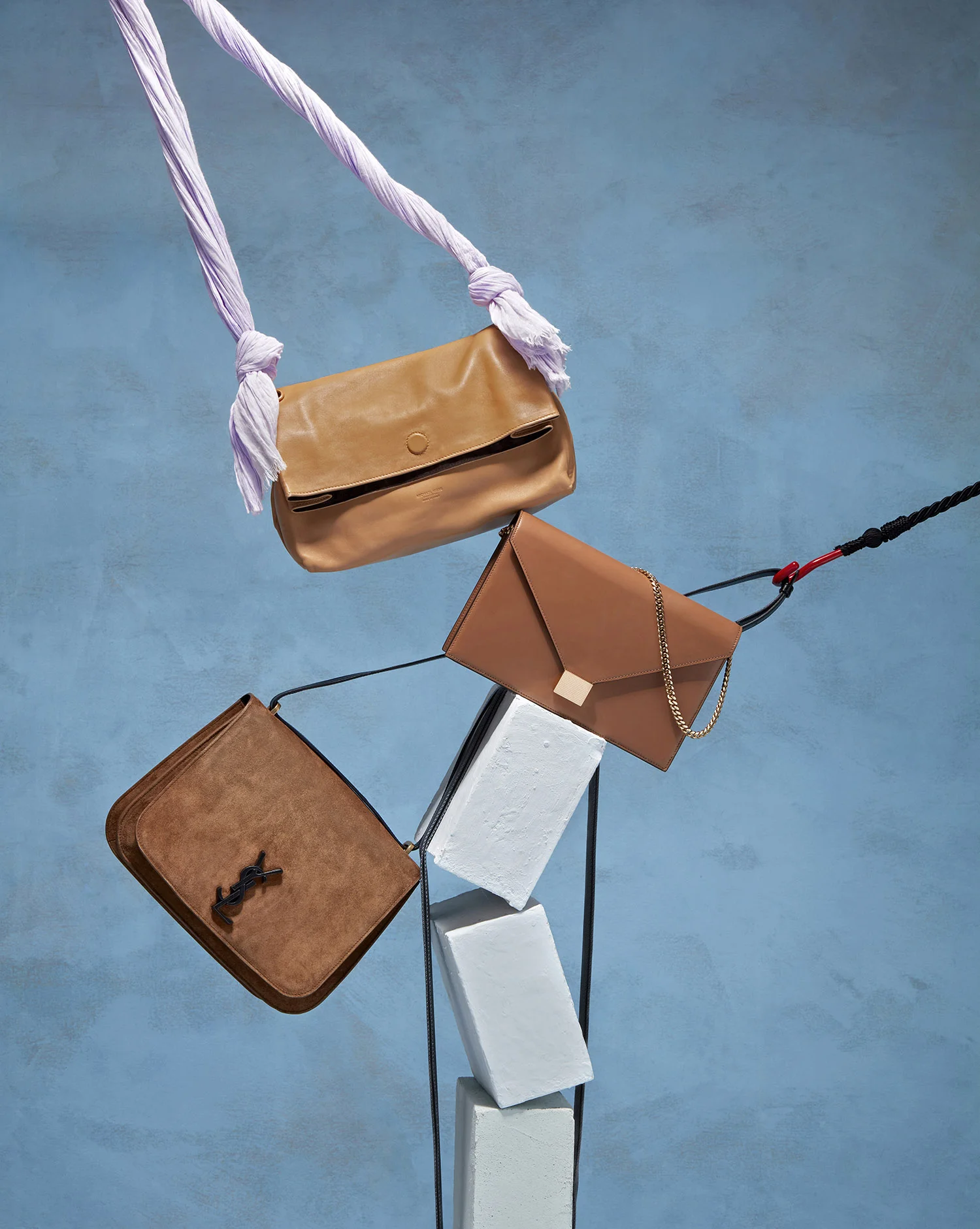 Sunday Times set design still life of tan bags