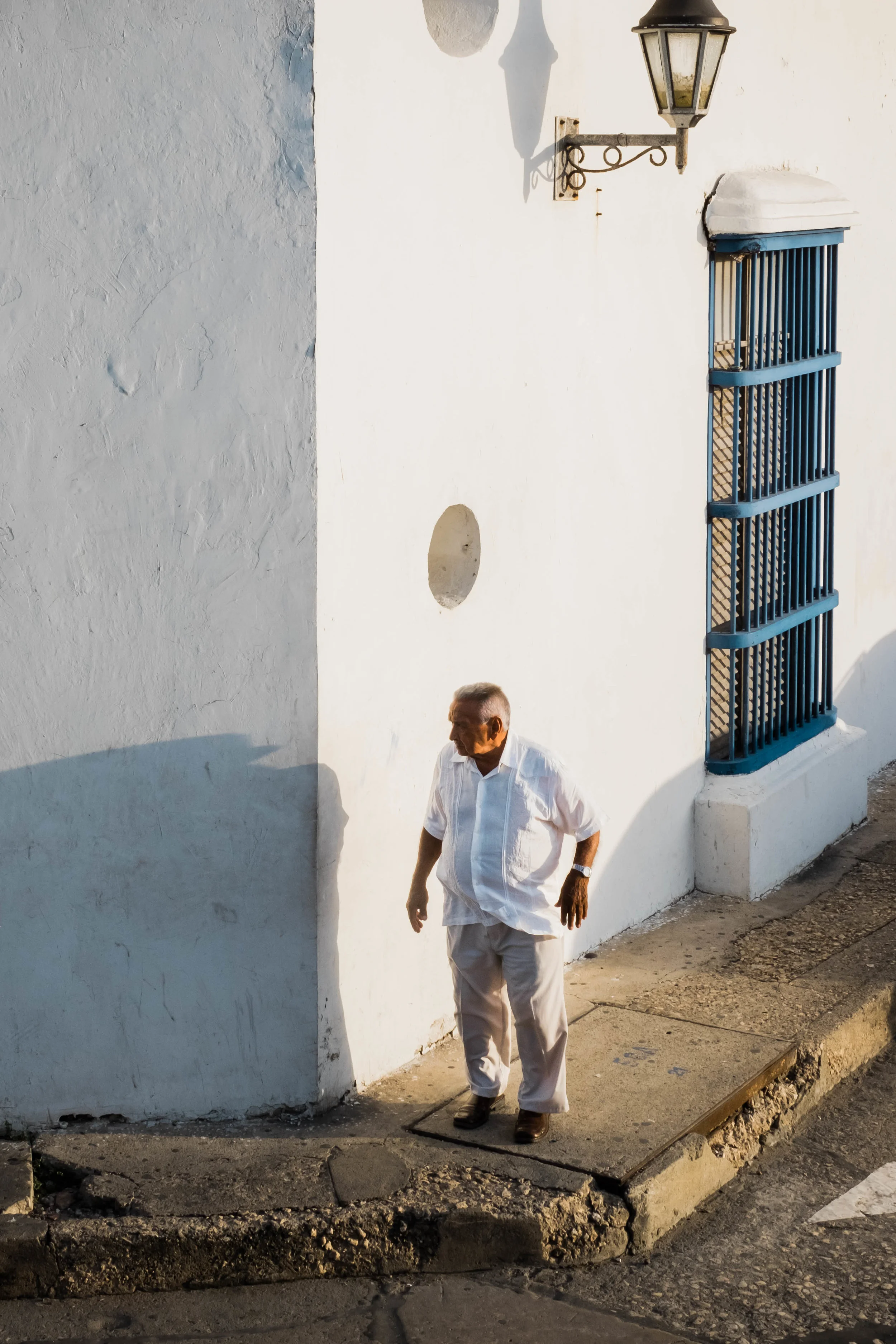 Man walking in the old city of Cartagena, Colombia.