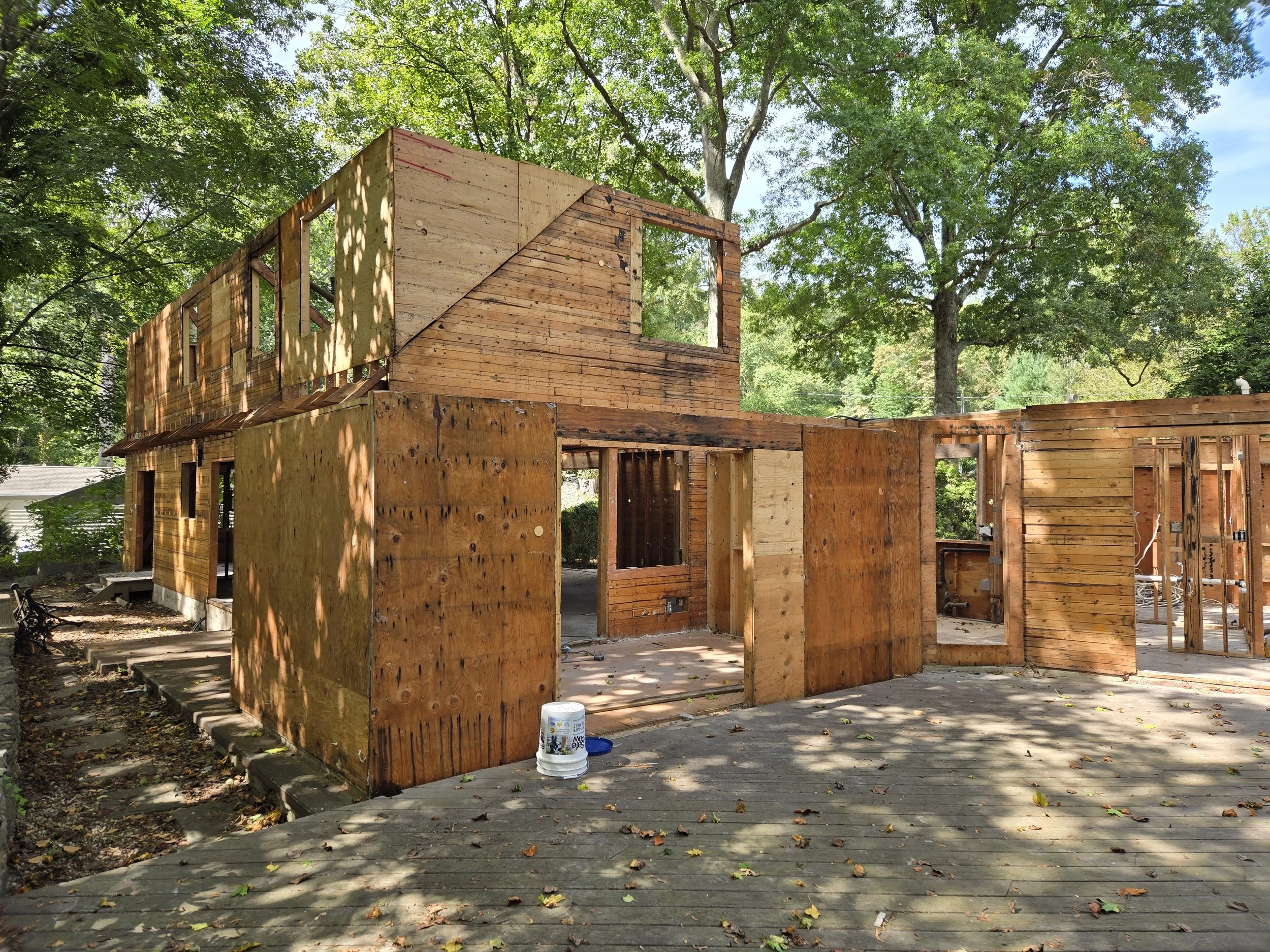 Rear of the West Hill Residence during demolition, showing removal of prior additions.