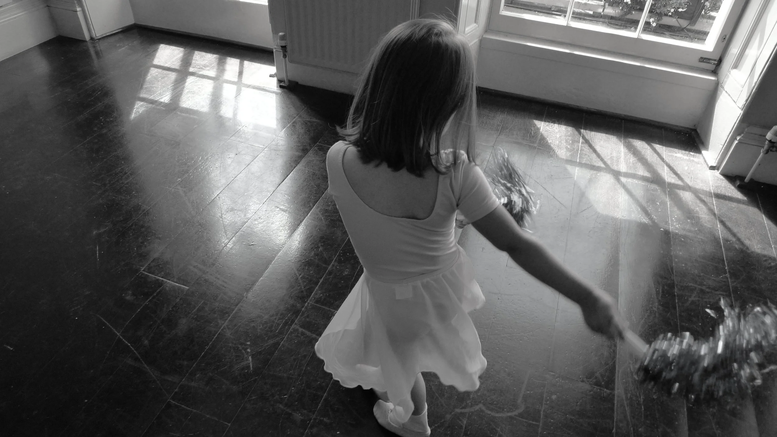 B marching with pom poms.JPG