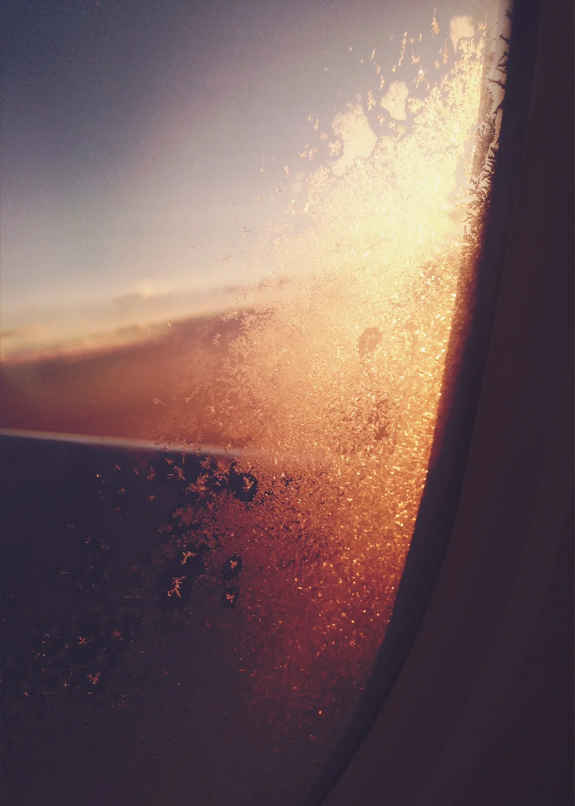 somewhere over Basin and Range. frost, window.