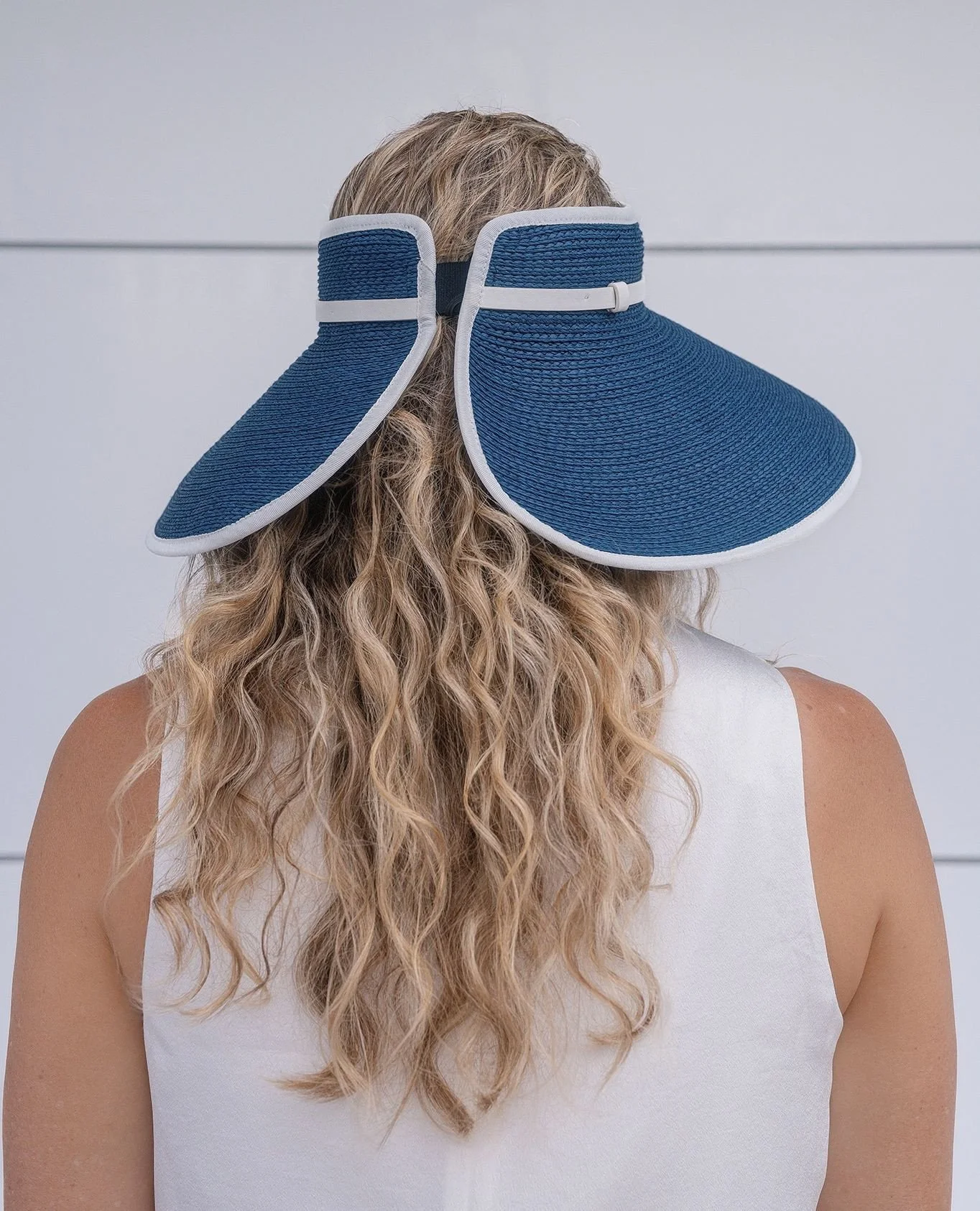 Flo Navy Roll Up Visor - She's pretty, packable and Wide-Brim - Perfect accessory to take wherever you go! ⁠
⁠
⁠
⁠
⁠
#sundaise #sundaisehats #hats #visor #panamahats #widebrimhat #summerstyle #sunprotection #beachstyle #instyle #style #instafashion #