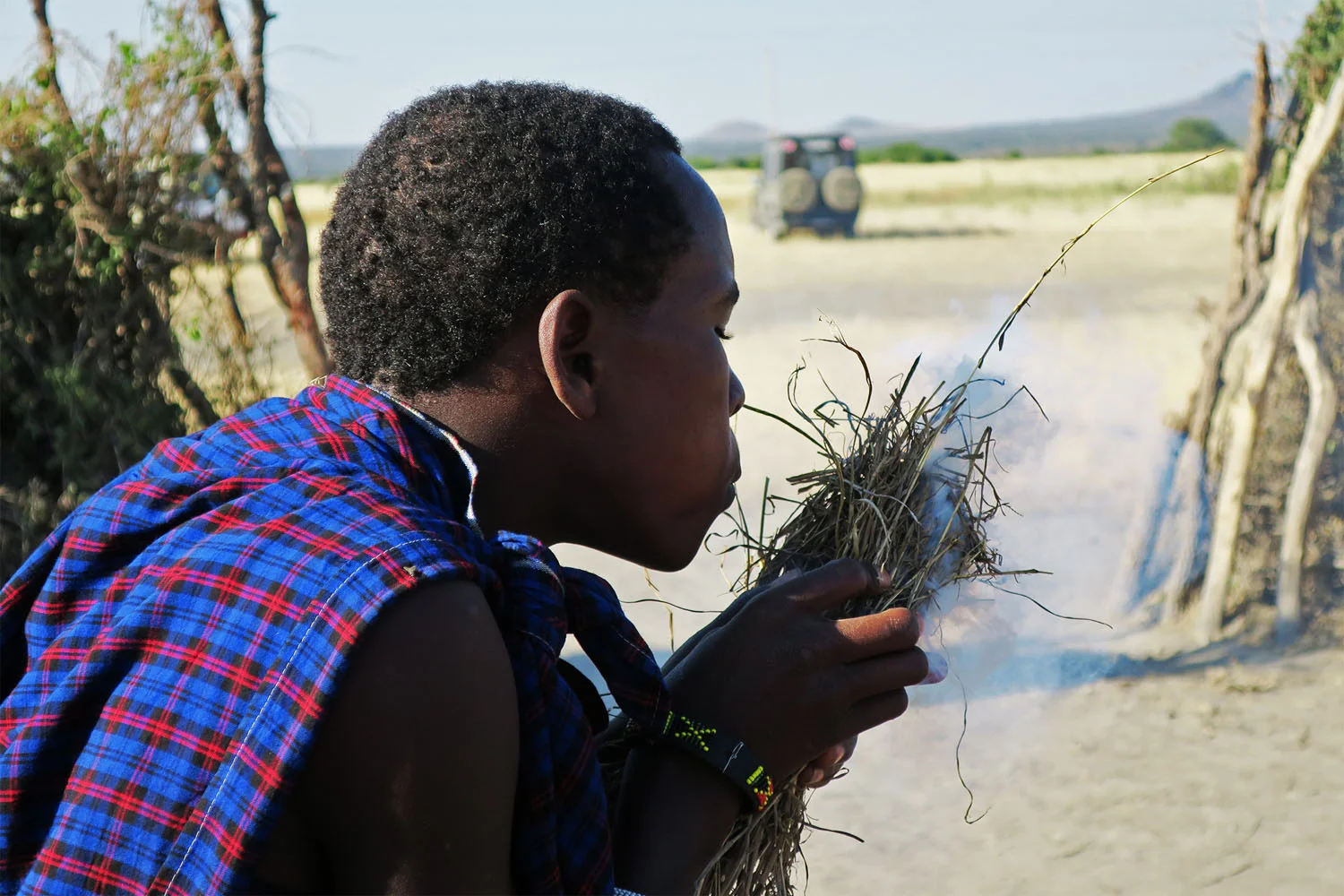 tanzania_safari_masai_fire.jpg