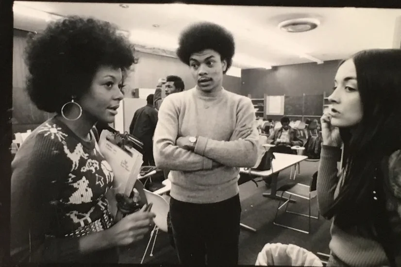 English teacher George "Sandy" Campbell with students, ca. 1971, at Harlem Prep