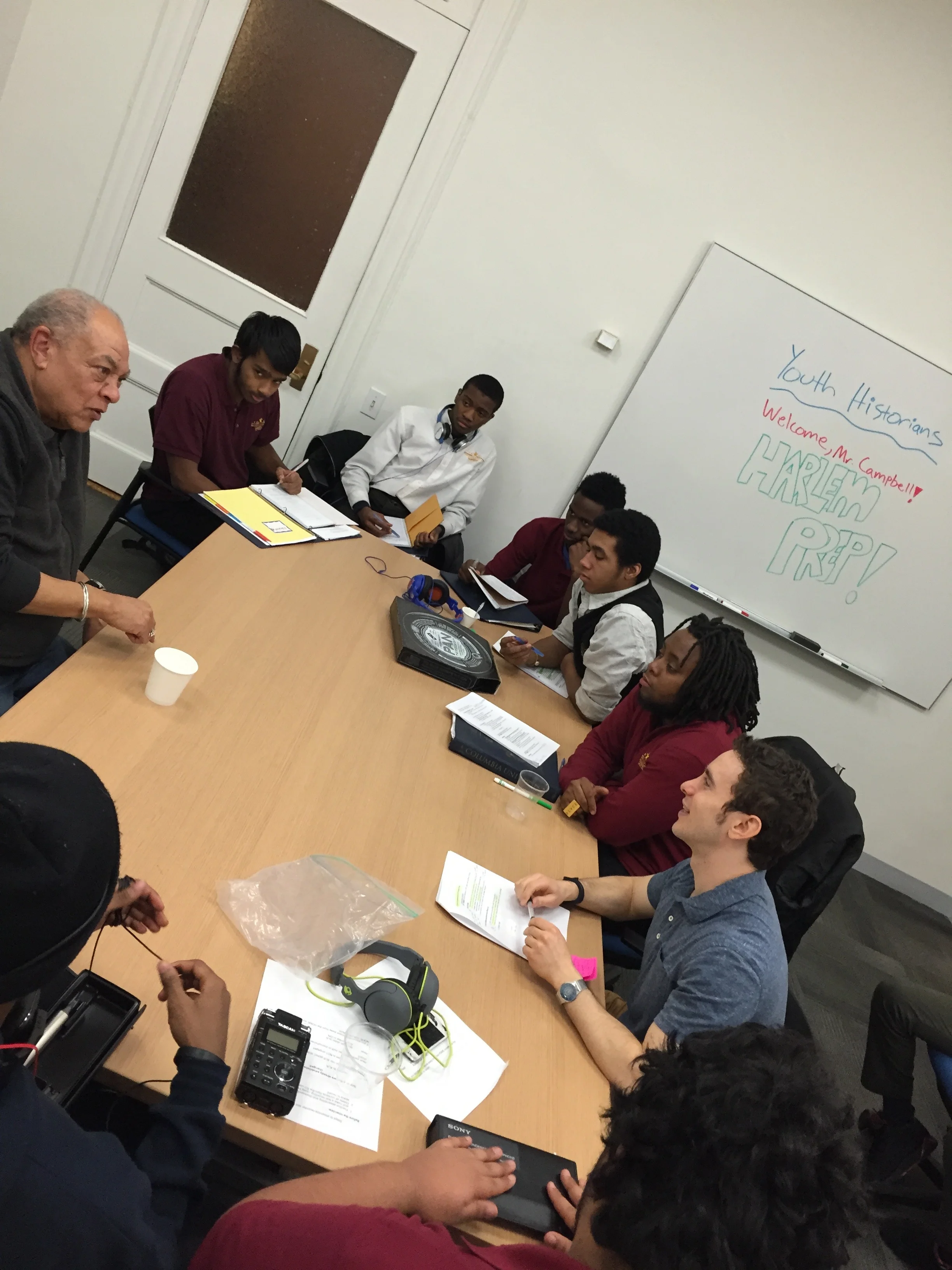 George "Sandy" Campbell being interviewed by Barry Goldenberg and Harlem high school students