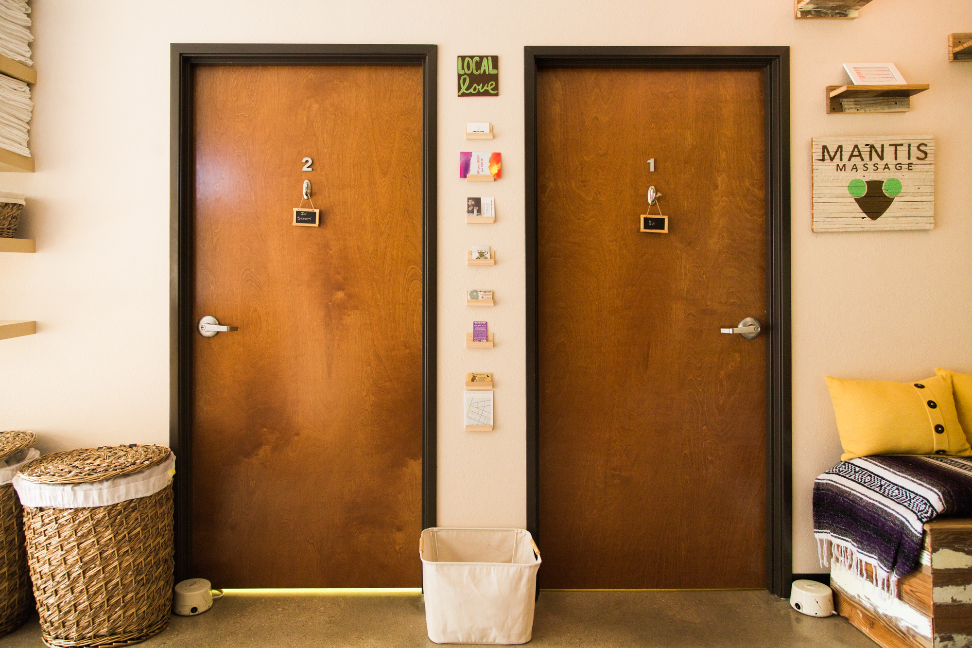  Image shows two doors to private massage rooms at Mantis Massage in Austin, TX. Our secluded sanctuaries offer a haven of relaxation, where skilled therapists provide personalized treatments to rejuvenate your body and mind. Trust in Mantis Massage 