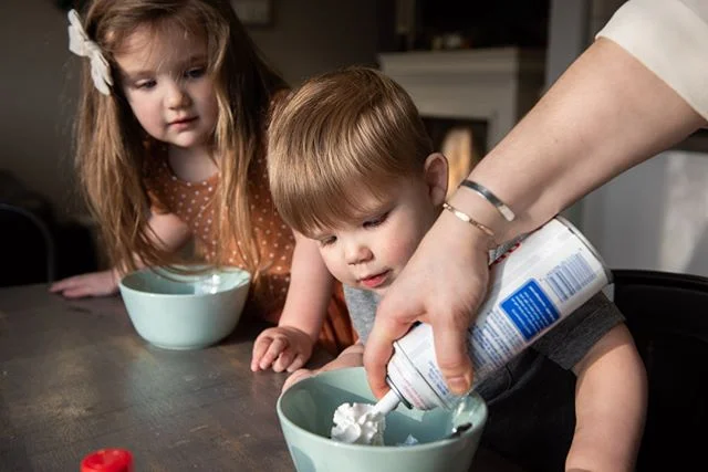 Checking to be sure there is enough whipped cream on top of the ice cream! #familylifestyle #boisephotographer