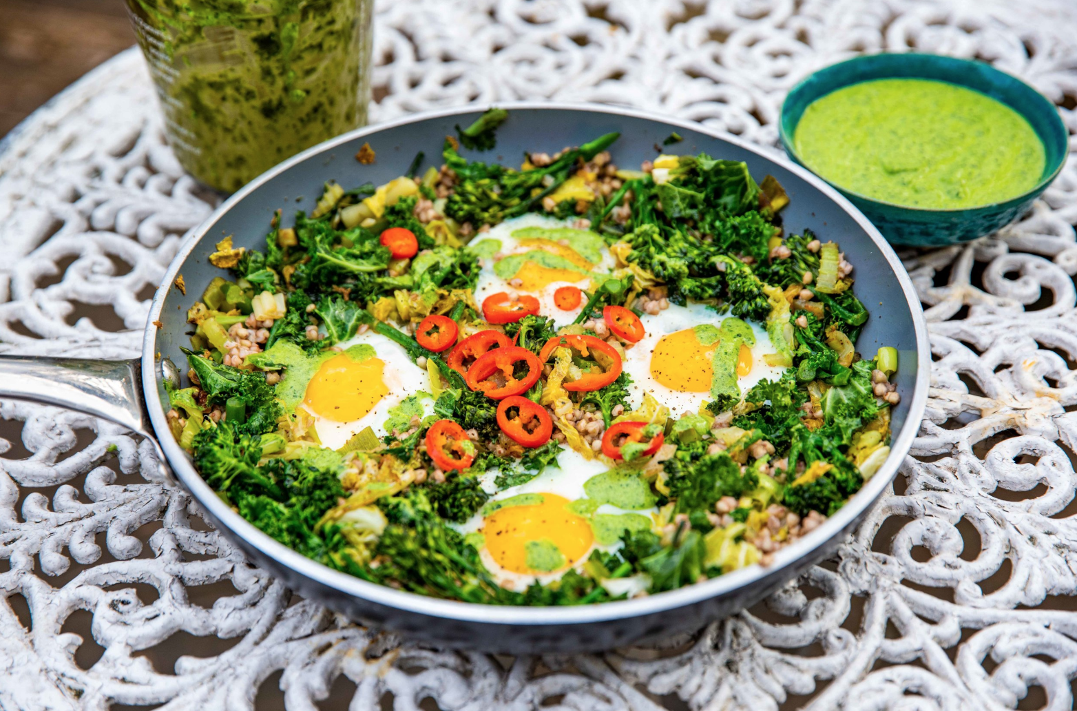 GREEN SHAKSHUKA EGGS WITH BUCKWHEAT GROATS AND CHIMICHURRI CREAM