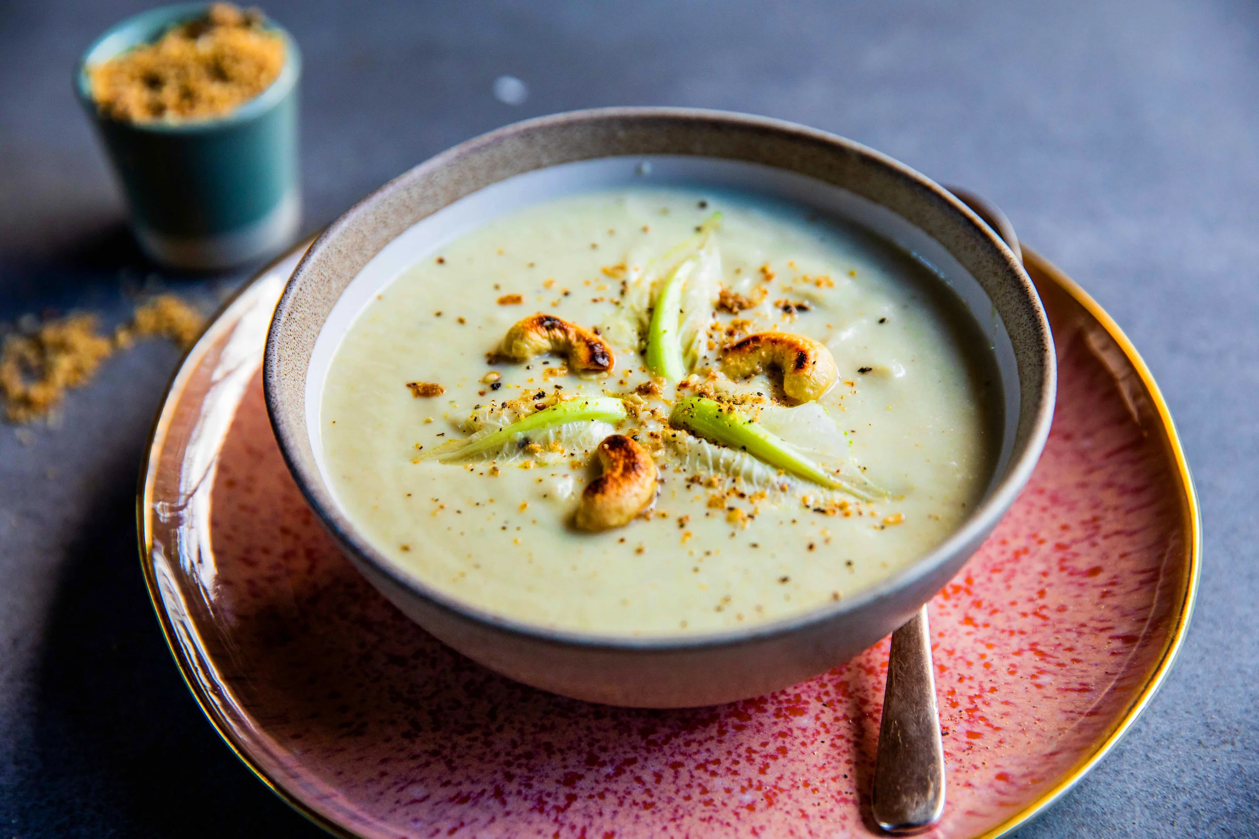 CASHEW AND CAULIFLOWER SOUP WITH OREGANO, CHILLI AND LEMON ZEST GOMASHIO