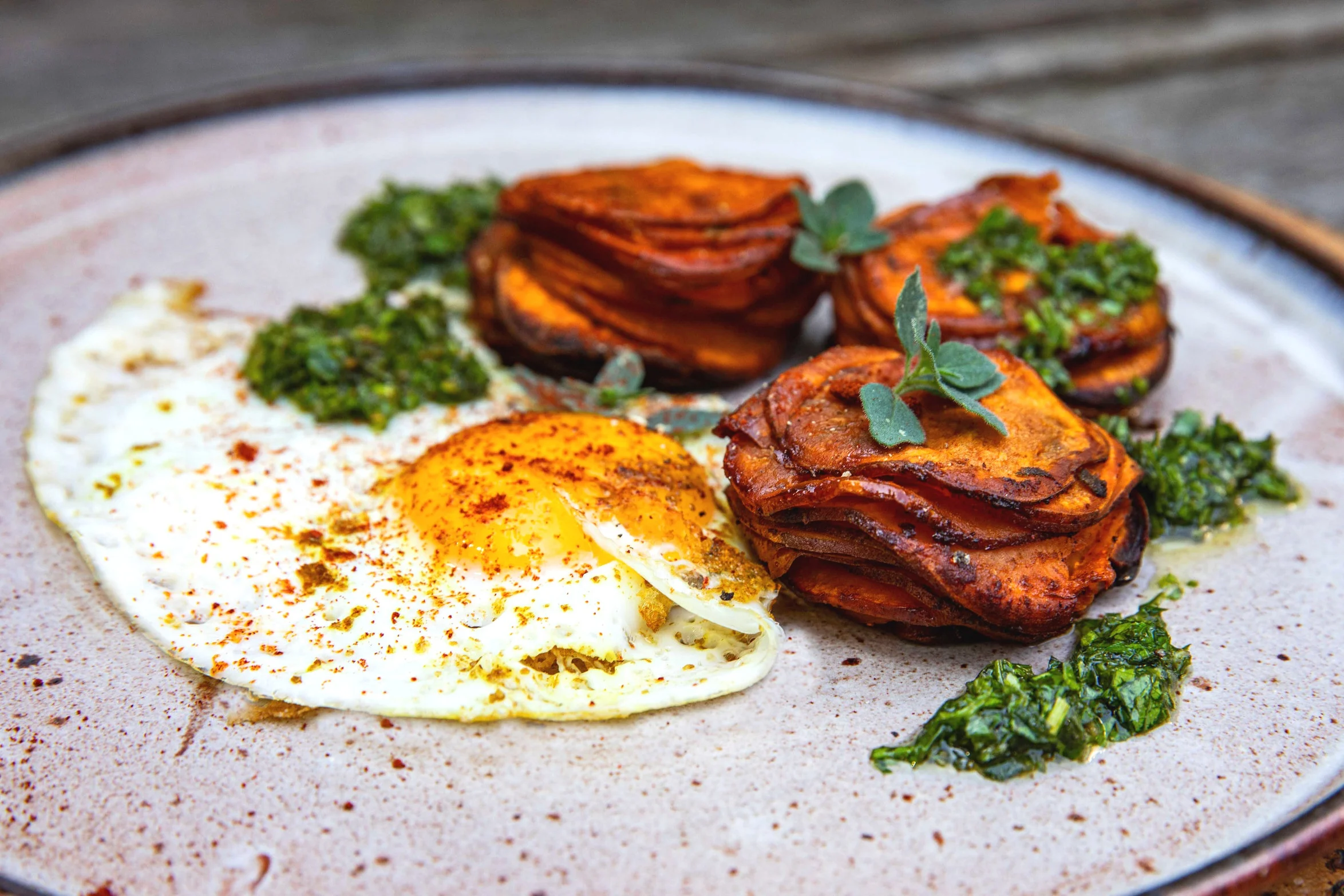 OREGANO AND SMOKED PAPRIKA SWEET TATTY TOWERS WITH SUNNY SIDE UP EGGS