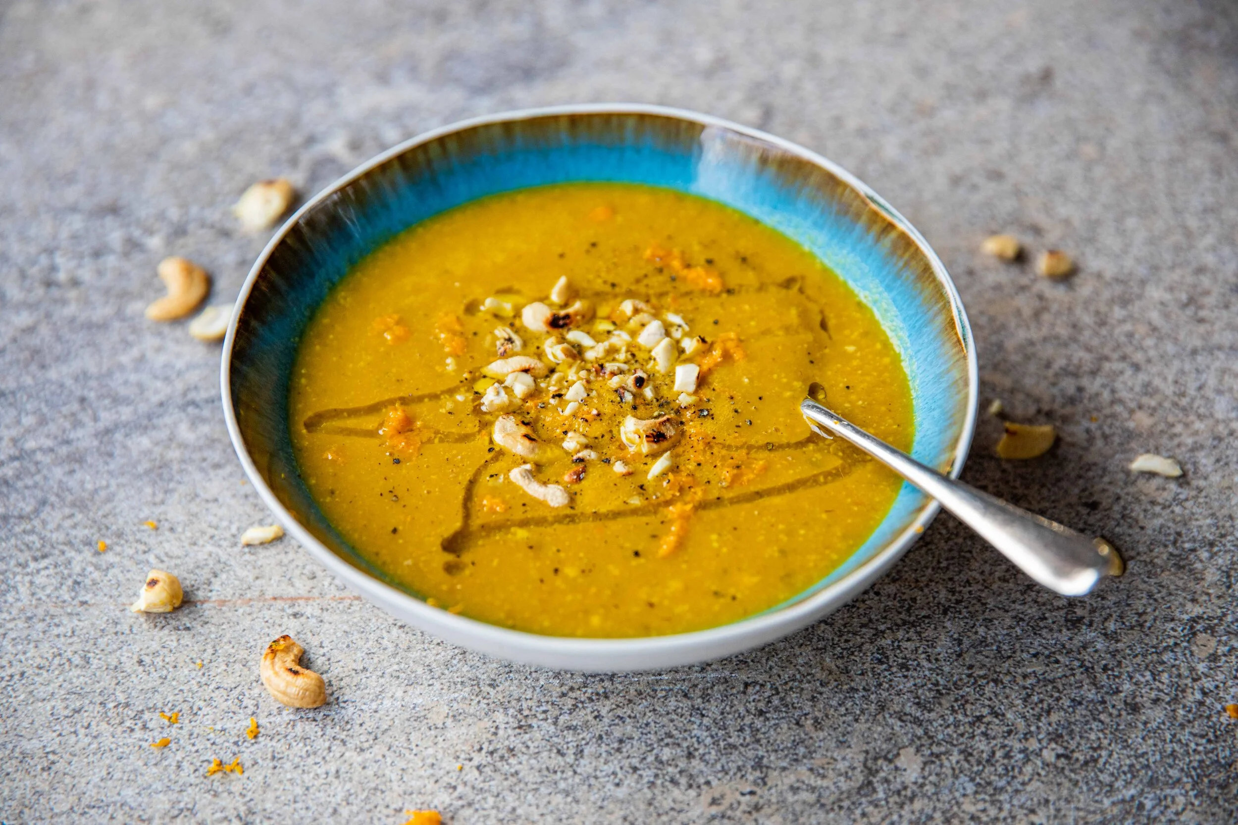 CARROT, CASHEW AND ORANGE SOUP WITH RED LENTILS AND MADRAS SPICE