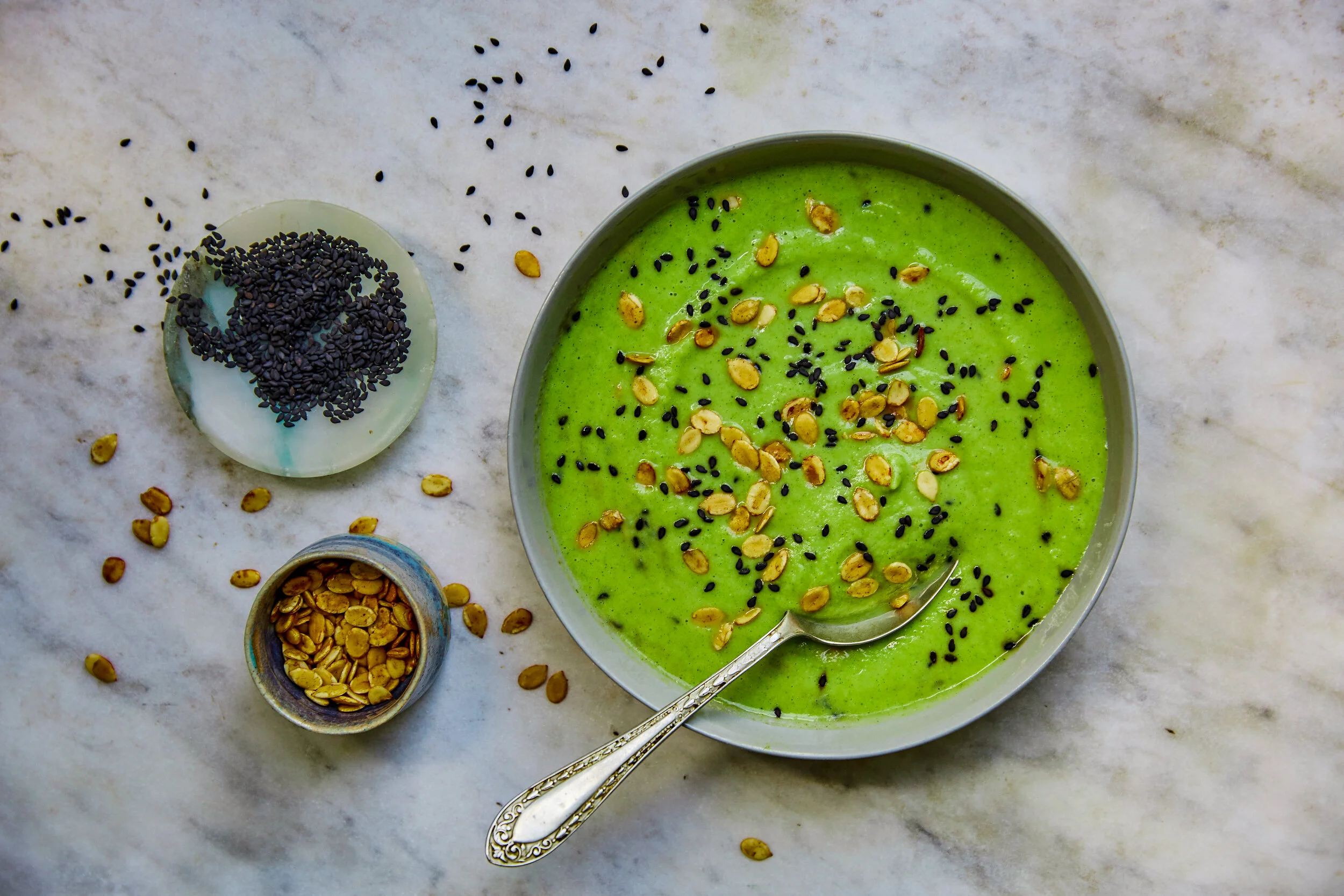 CREAM OF BROCCOLI SOUP WITH BLACK SESAME AND WATERMELON SEEDS