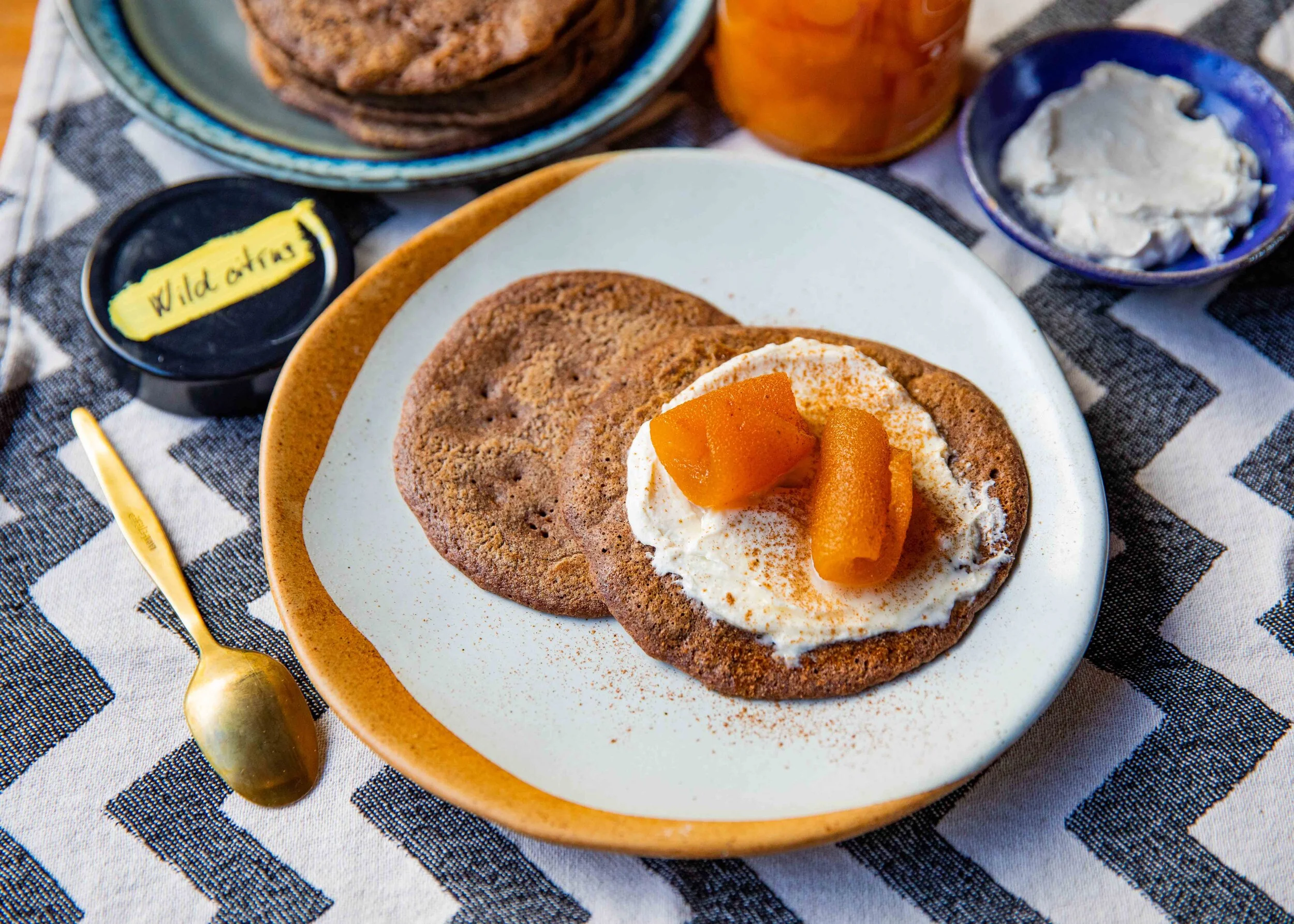 RAGI PANCAKES WITH ALMOND CREAM AND COOKED FRUIT