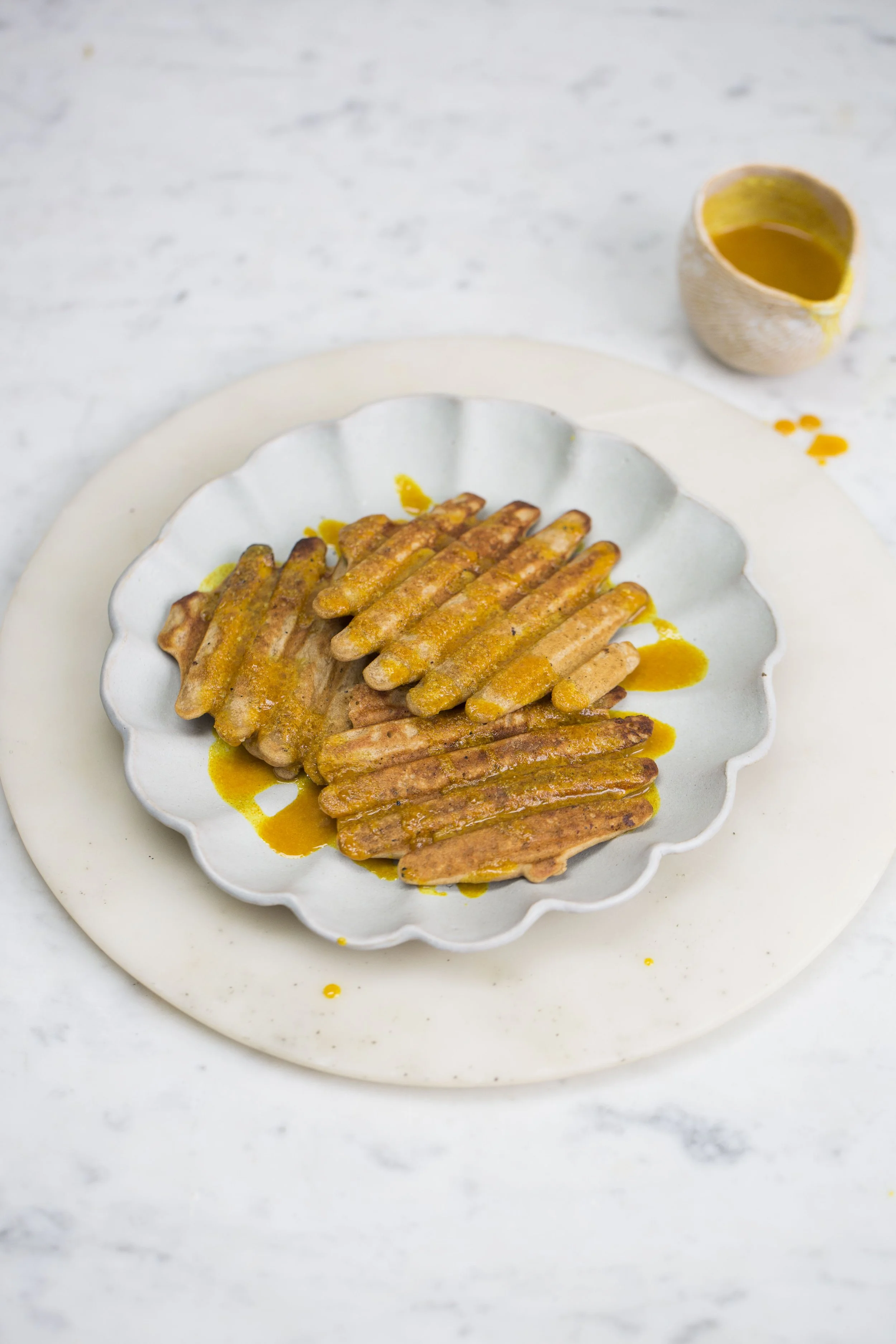 TEFF WAFFLES WITH TURMERIC AND HONEY DRIZZLE
