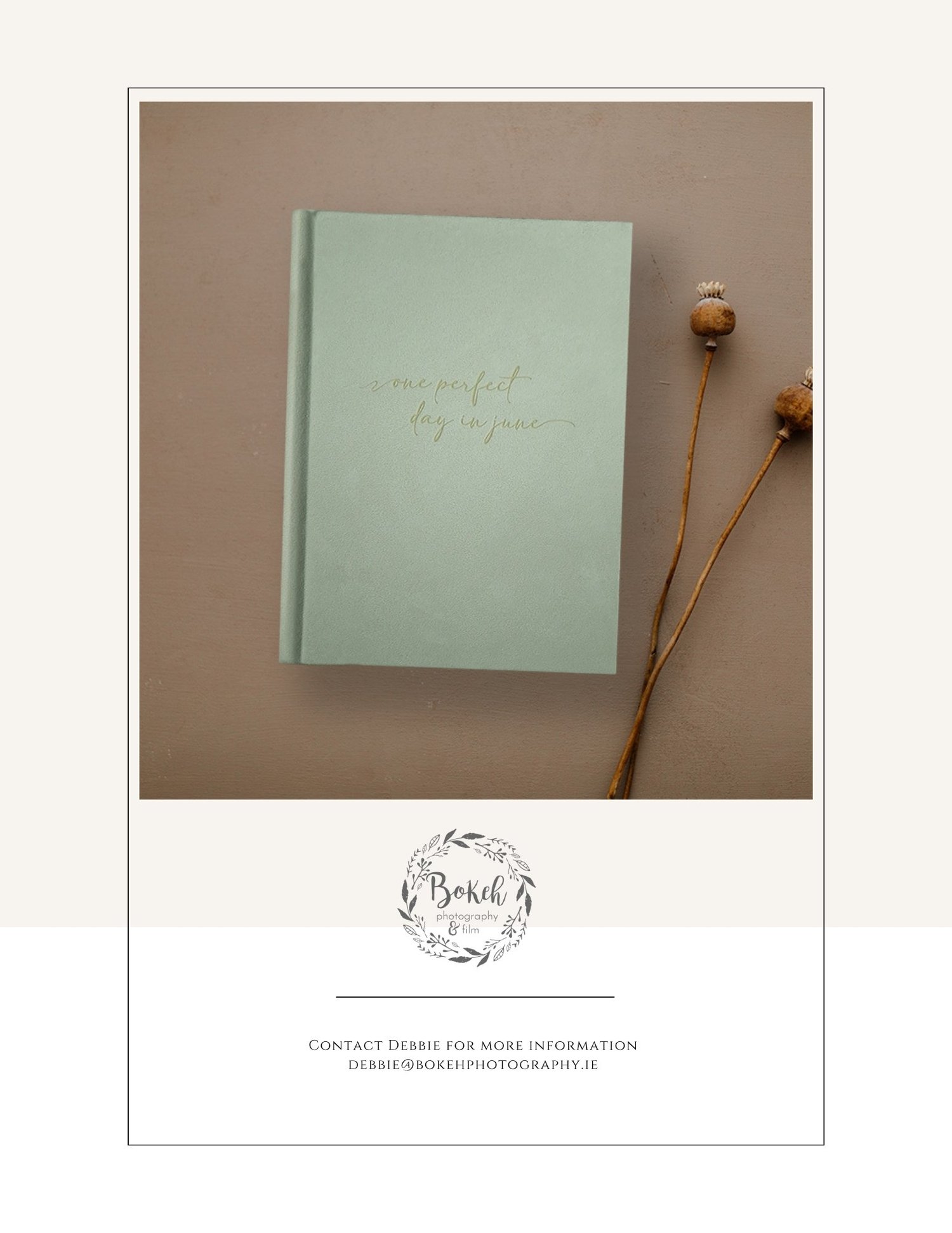 A pale green wedding album with a personalised cover