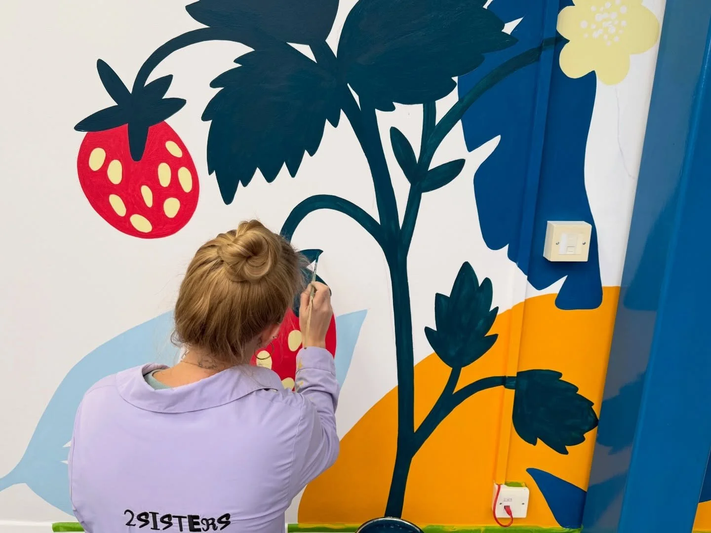The brightest, cutest, most cheerful mural for the lovely @saltoftheearthdeodorant 🧡🌍🌿 We had the best time working with these guys, and created a mural that greets staff and visitors as they come in every day. Each element of this mural reflects 