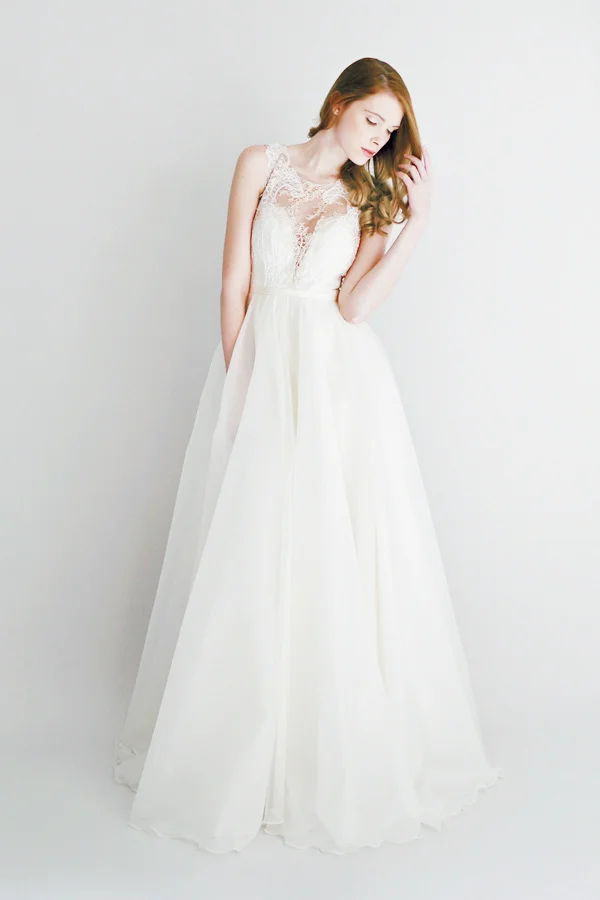 Ivory and nude lace illusion bodice gown with full silk organza skirt.