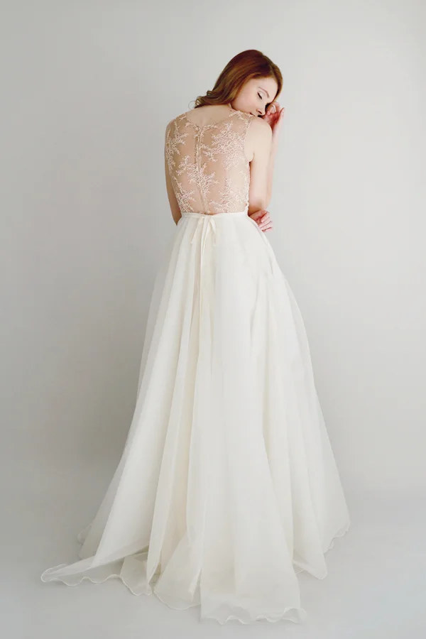Ivory and nude lace illusion bodice gown with full silk organza skirt.