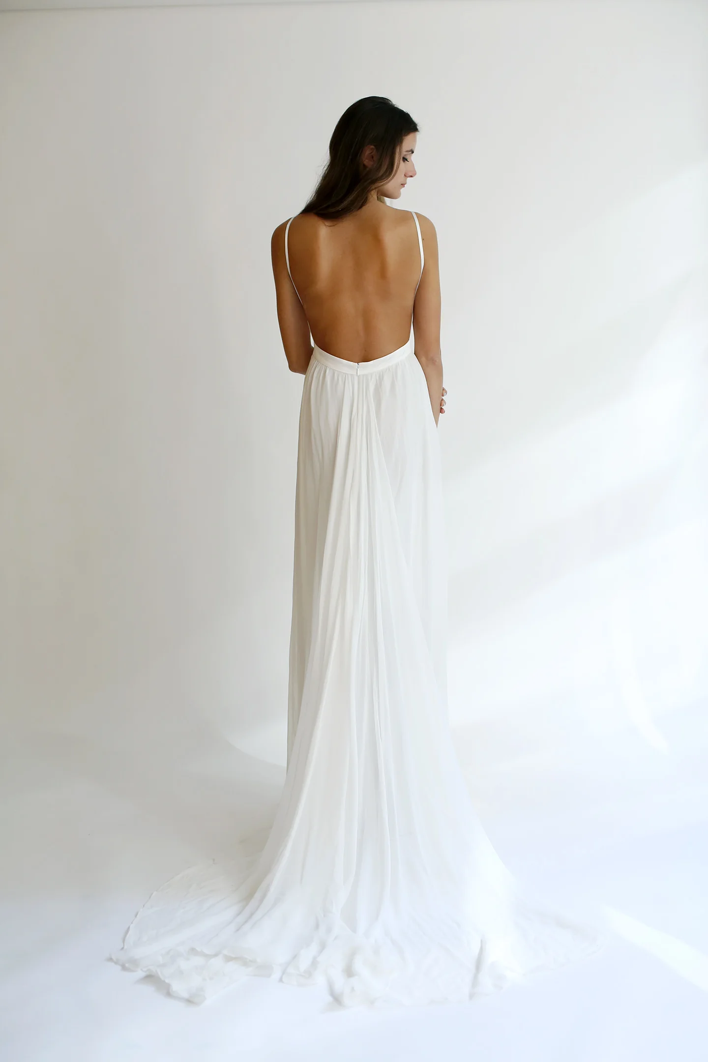 Copy of V-neck gown with lined silk- charmeuse bodice and wide-open back, and softly gathered silk chiffon skirt with slit opening at center front and long train in the back