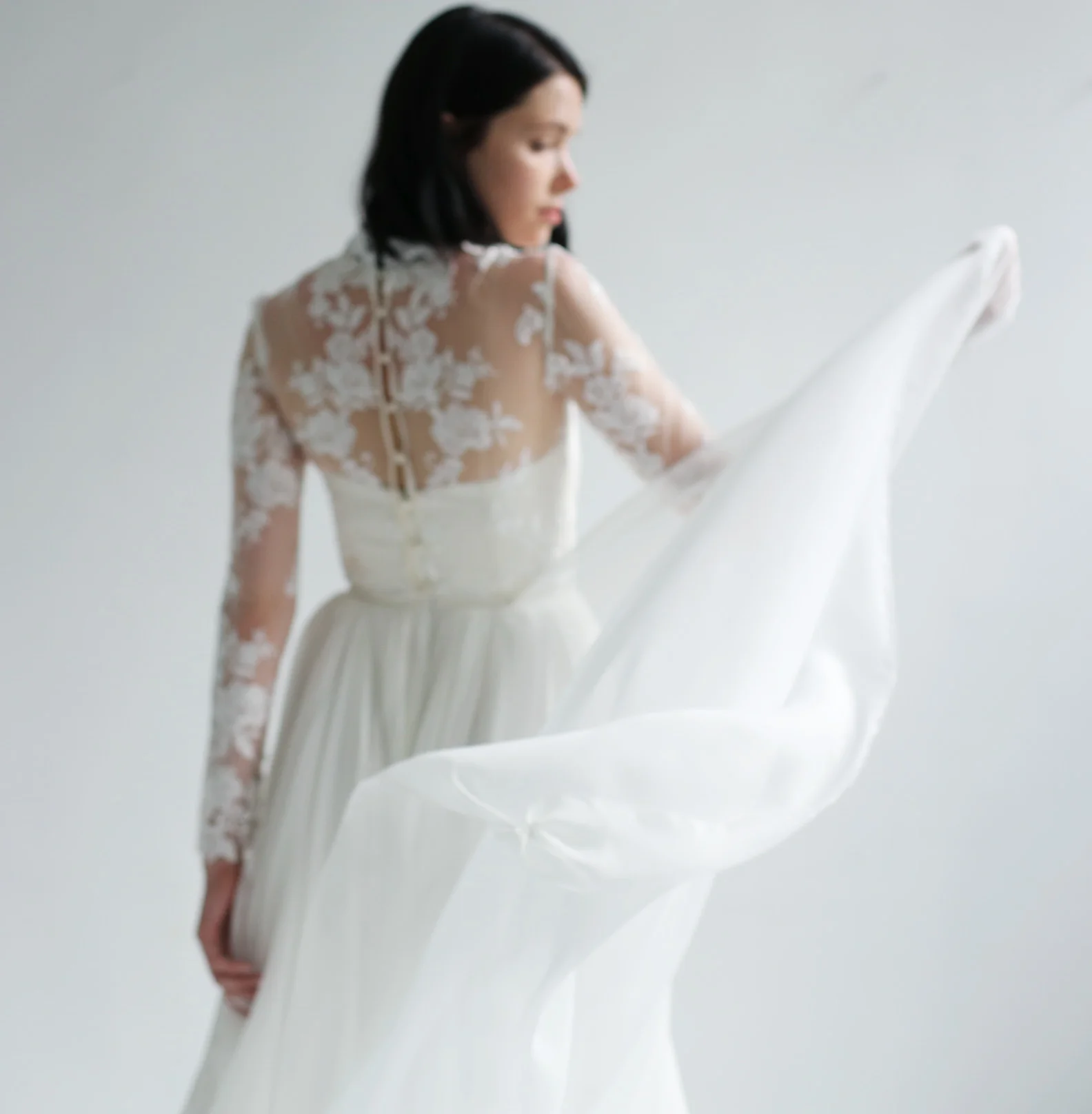 light ivory silk chiffon strapless sweetheart gown with removable long sleeve lace top. Boned bodice, lined in silk and has zipper closure up the back.