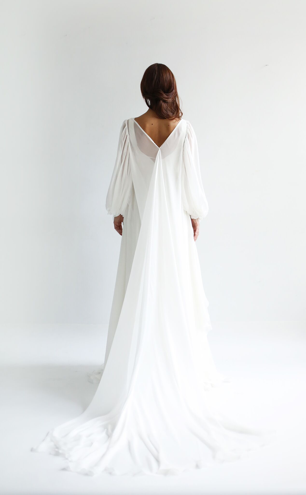 Copy of Light Ivory nesilk chiffon layering piece with full sleeves and long train. Has tie sleeves and optional ties at waist.