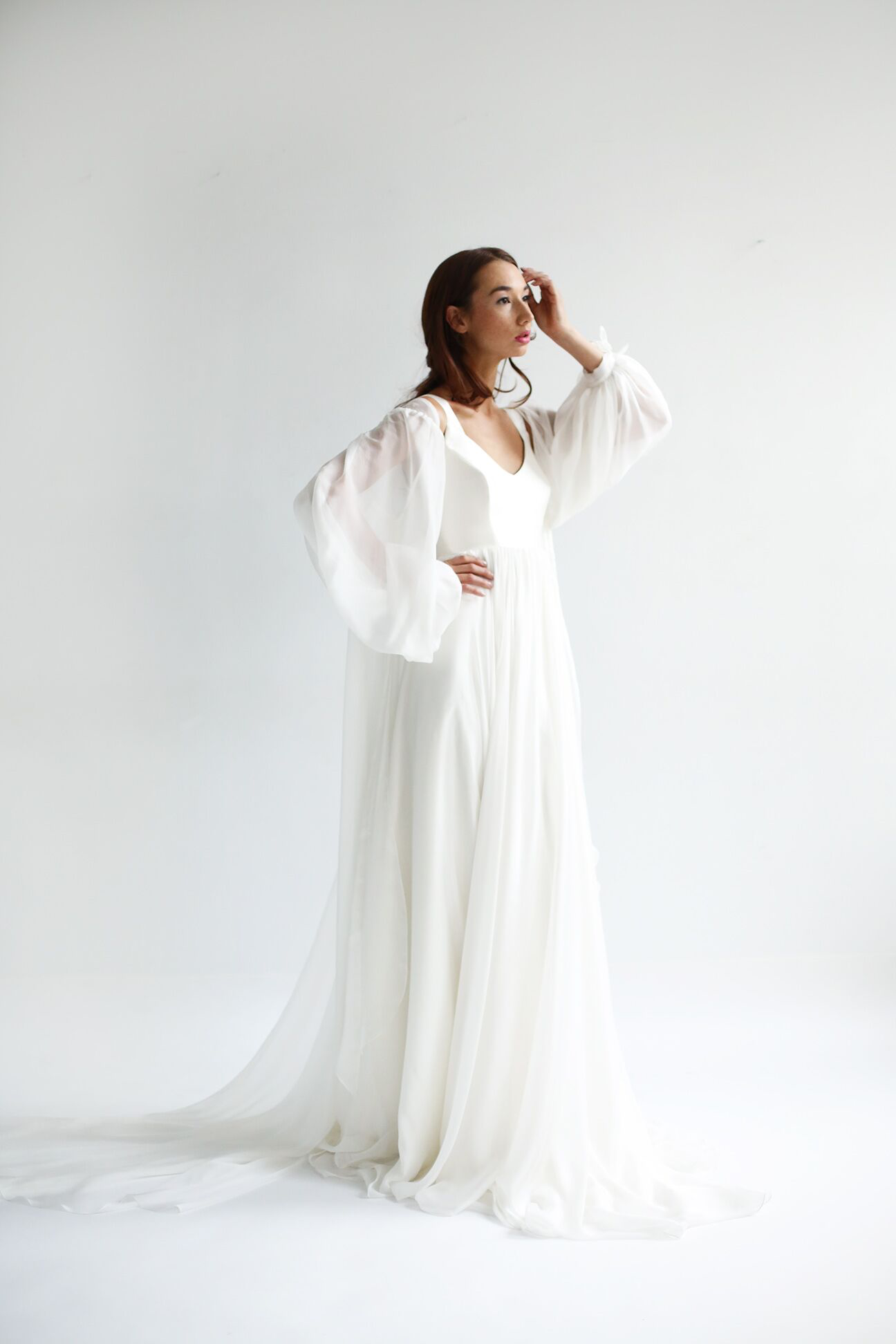 Copy of Light Ivory nesilk chiffon layering piece with full sleeves and long train. Has tie sleeves and optional ties at waist.