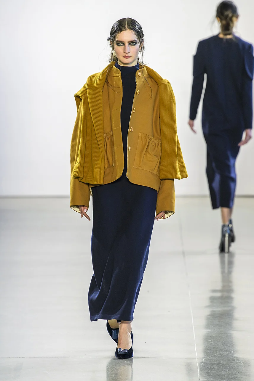 Rich organic cotton canvas jacket with pouch pockets. Fully lined in silk. Button up front and boxy oversize fit.