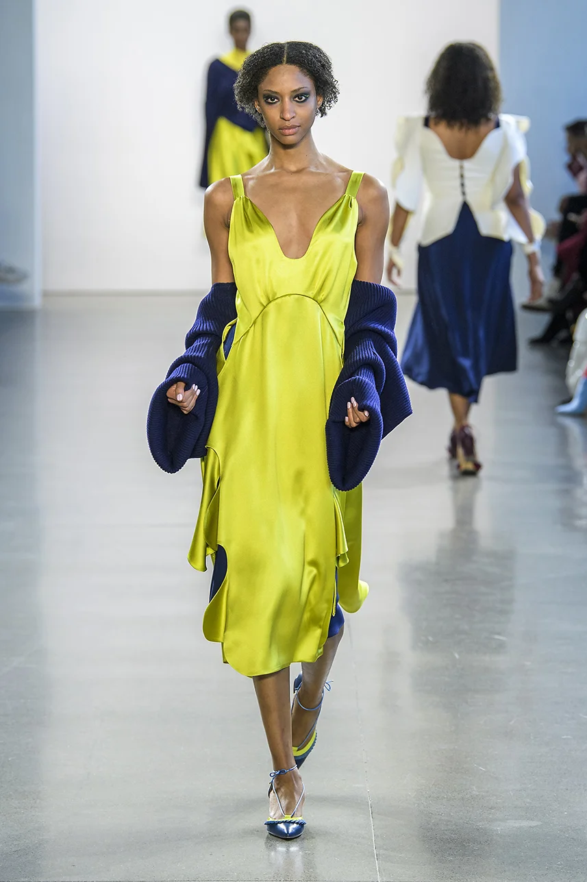 Chartreuse silk double charmeuse dress with scalloped wave cut-out skirt. (shown layered over navy slip) Soft gathering at bust. Zips up back. Skirt can be tied closed with attached strings.