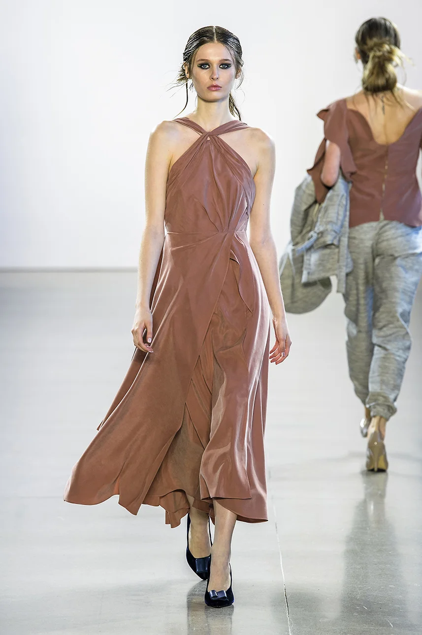 usty rose blush dress in a fine sustainable sueded Tencel gabardine blend. Structured, boned bodice with asymmetrical draping and darts. Open cut back. Zipper up back.