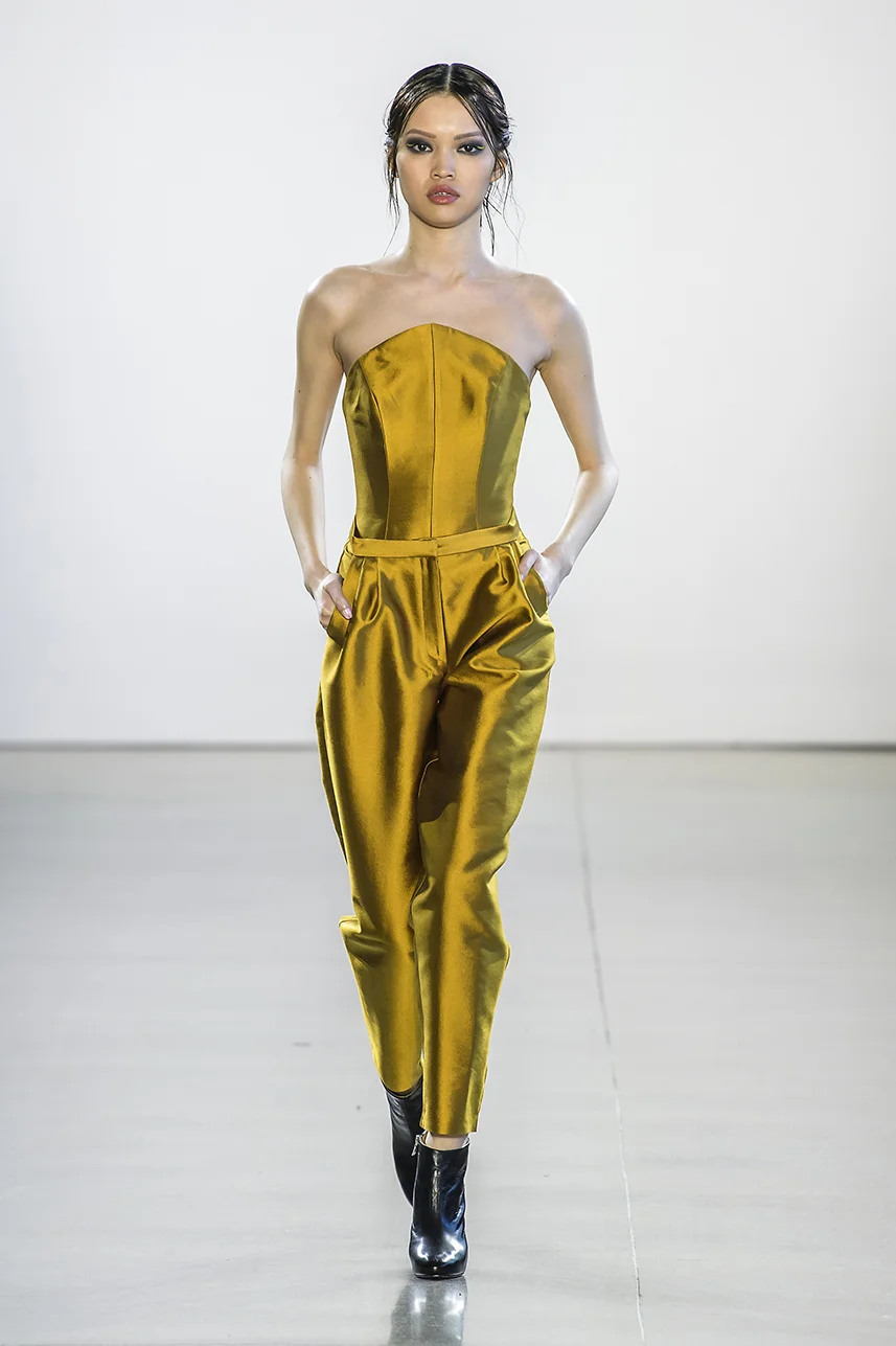 Gold bustier with pleated pants (separates) in a rich deep gold silk twill. Bustier has drop waist, fully lined and supported with boning. pants are slim cut