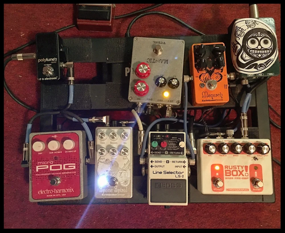 Line out from my bass preamp (first in chain, bottom right) to the DI I keep on my pedalboard (top right). Photo: Bradley Thorla