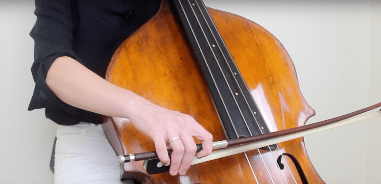 Crossing Strings in a Slur