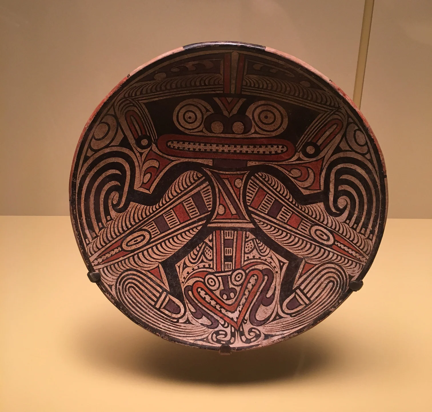 Greater Cocle jar with crocodile design, AD 950-1100. Parita, Herrera Province, Panama. Pottery, clay slip, paint. MAI purchase from Philip L. Dade, 1964. 
