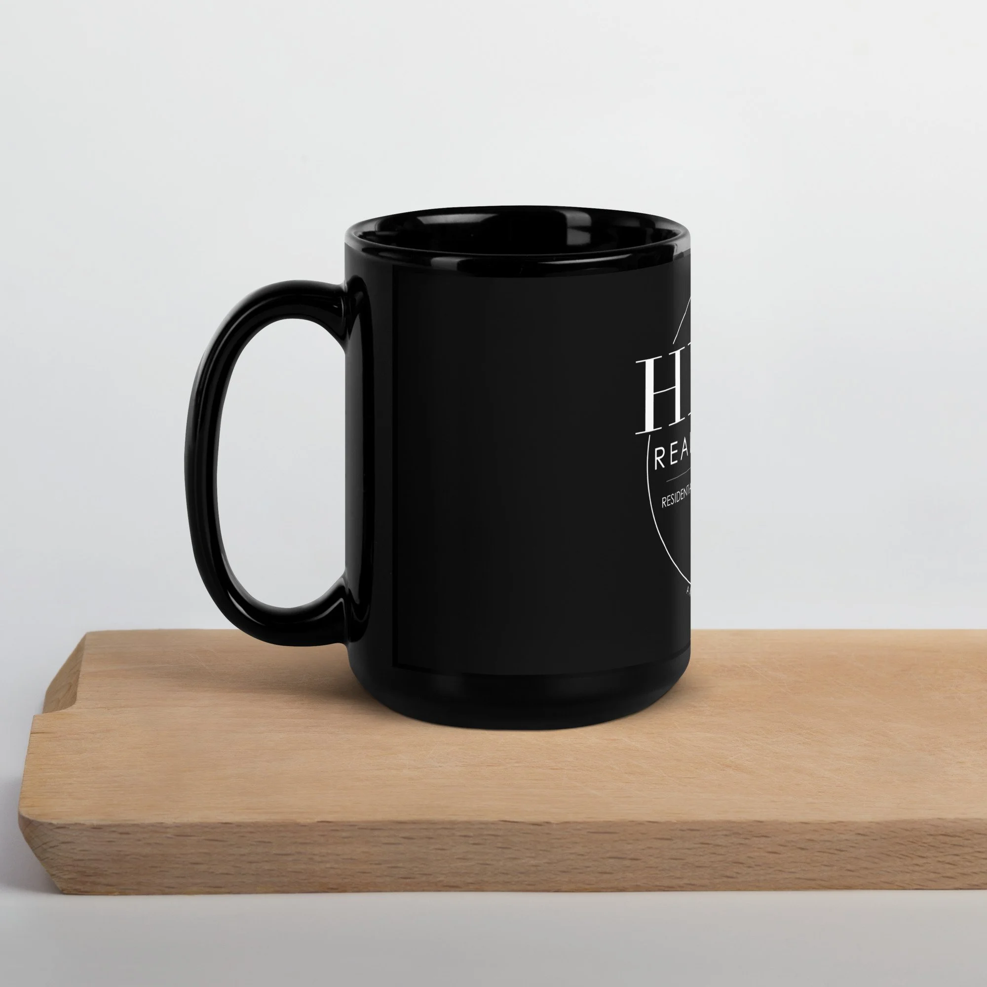 black-glossy-mug-black-15oz-handle-on-left-63c0263174f51.jpg