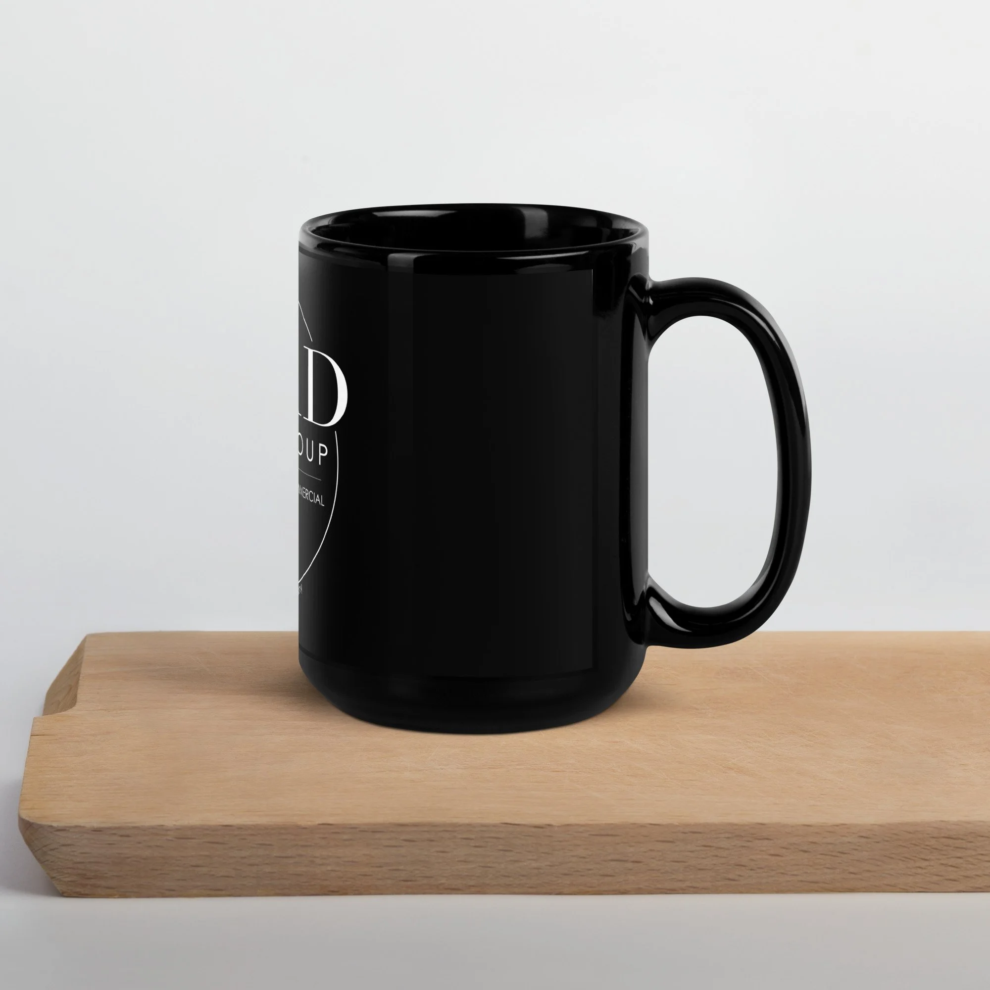 black-glossy-mug-black-15oz-handle-on-right-63c050a7561d5.jpg