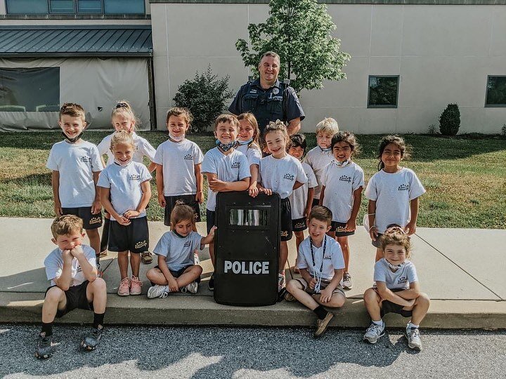 Thank you to Officer Rob Paradis from Upper Uwchlan Police Department for visiting with St. Elizabeth Kindergarten students as an extension of Career Day. Students had the opportunity to ask questions and explore the equipment and vehicle used daily 