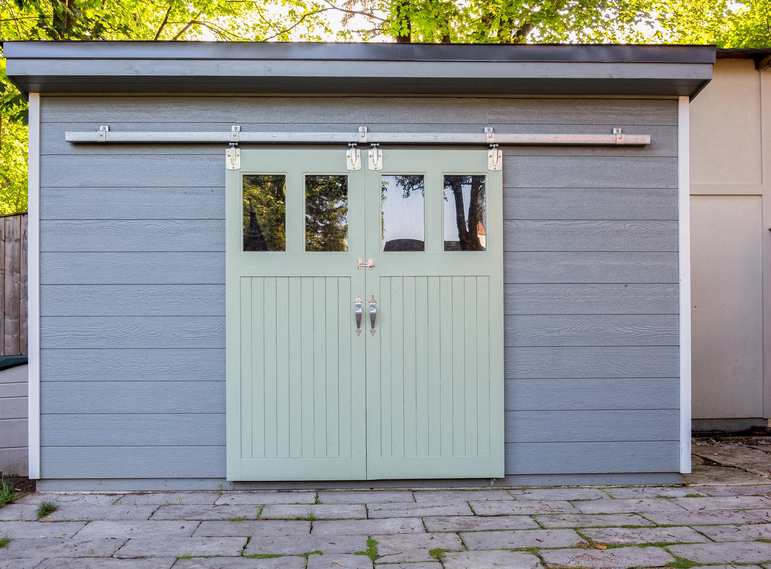 Toronto, Canada 2015 Another Anex Works Inc and client collaboration to realize a storage area customized to the clients' needs and taste. Doors handcrafted by Anex Works tradespeople. for a truly customized look and function for the client. 