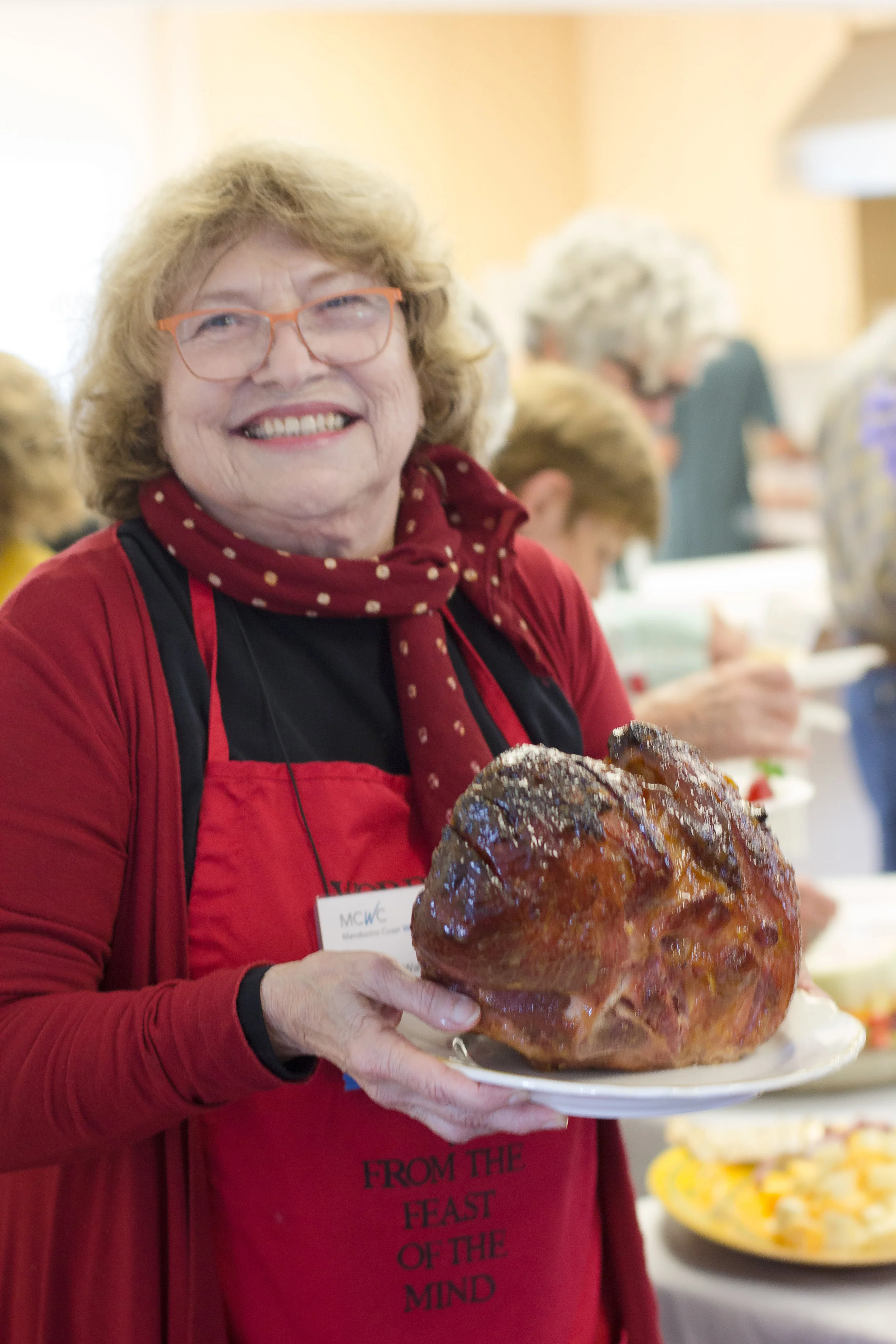 Norma Watkins helping at the MCWC 2017 Thursday Mixer