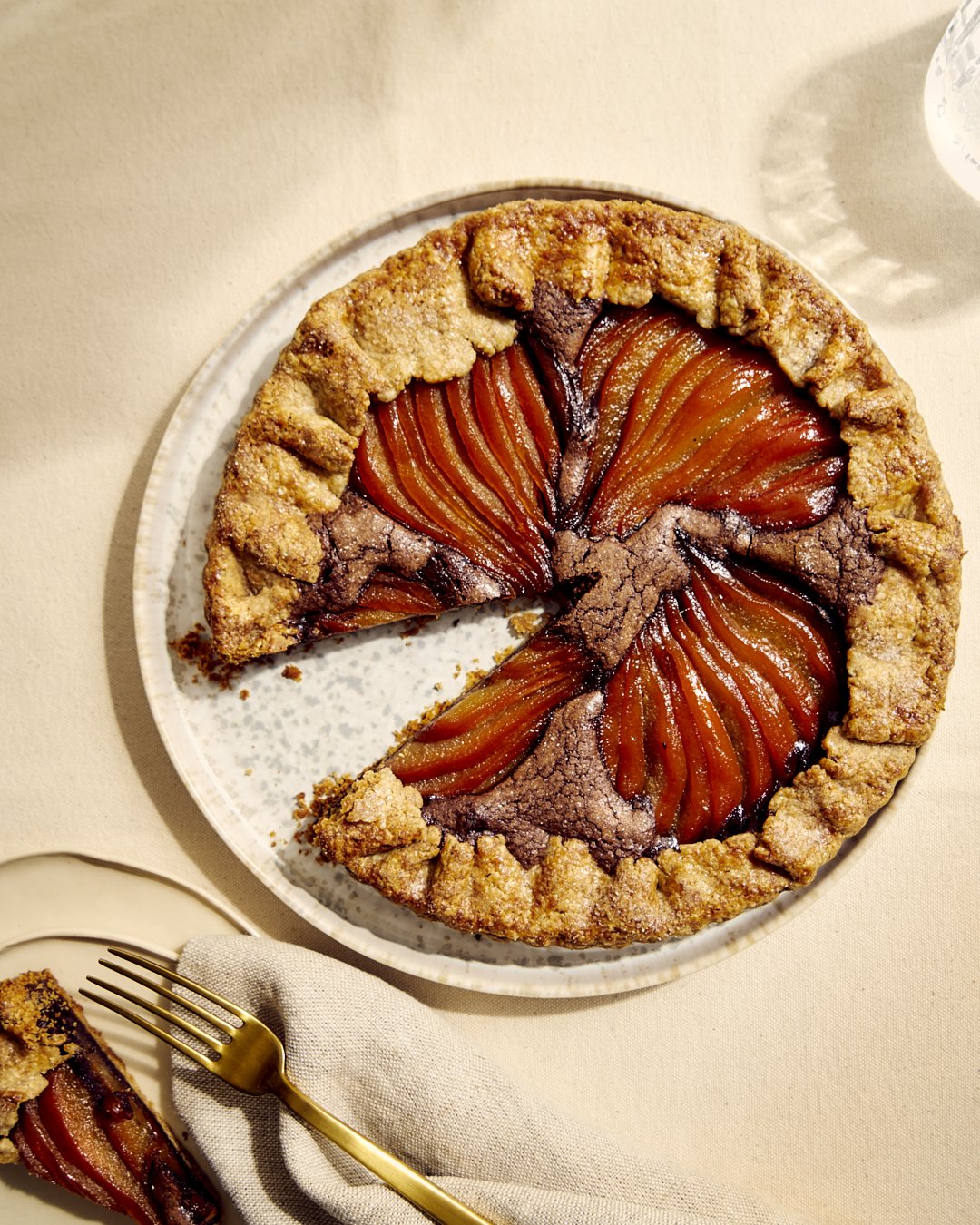 Poached pear and chocolate frangipane tart