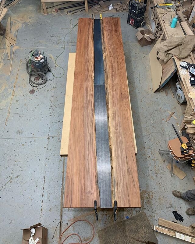 15&rsquo;x42&rdquo; Sycamore river table. This slab has been sitting around the shop for a couple years now. My favorite wood species. Happy to see it going to a good home. 3/16&rdquo; steel plate inset into bottom of the slabs.