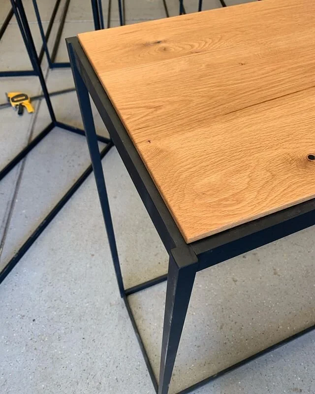 The details on this really pop. Rustic white oak on fat black base. All solid stock. 17 tables headed to site Tuesday.