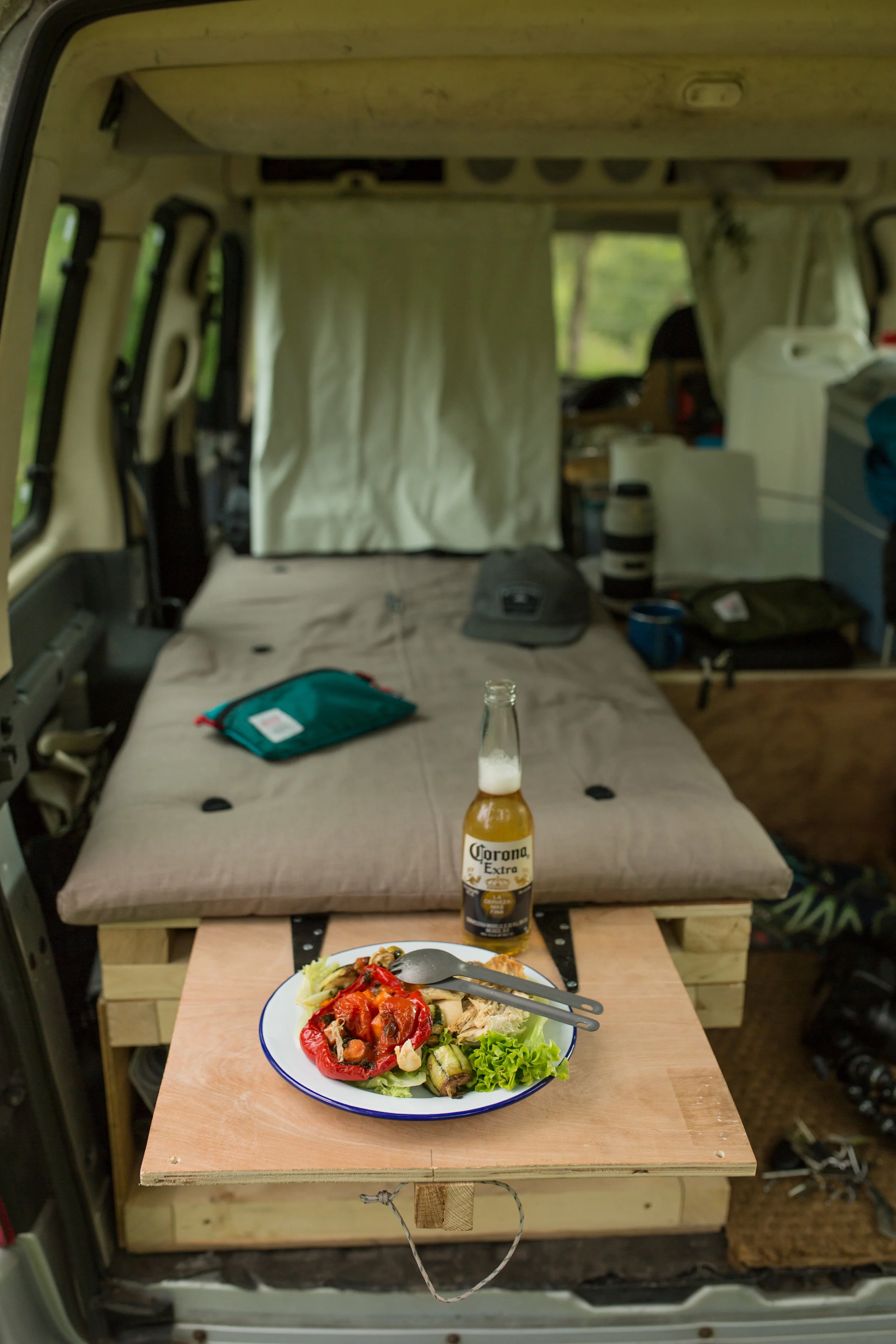 Dinner served on the fold out table and my bed behind it.