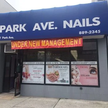 Under New Management Sign.jpg