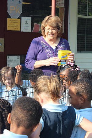 Vickie Mayeaux helps her pre-K class making the connection between full bellies and farming. Mayeaux’s class raised carrots and chickens through the school year not only to teach her class about agriculture, but using ag as a way of teaching math, science and reading. Mayeaux said making that connection is important for students of any age and many of the other classes at Cottonport Elementary used the Ag in the Classroom material to teach their students as well. Photo by Monica Velasquez.