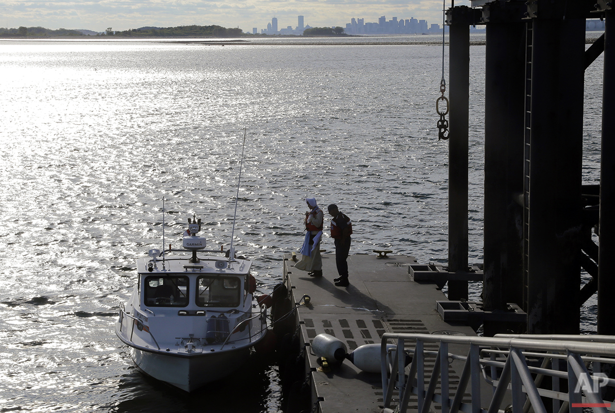  In this Aug. 17, 2016 photo, Sally Snowman, left, the keeper of Boston Light, and her husband, Jay Thomson of the Auxiliary Coast Guard, stand on the dock of Little Brewster Island in Boston Harbor. (AP Photo/Elise Amendola)&nbsp;See these photos on
