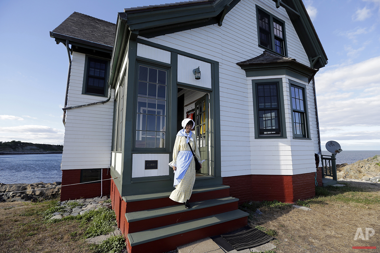  In this Aug. 17, 2016 photo, Sally Snowman, the keeper of Boston Light, steps from the keeper's house on Little Brewster Island in Boston Harbor. (AP Photo/Elise Amendola)&nbsp;See these photos on  APImages.com  