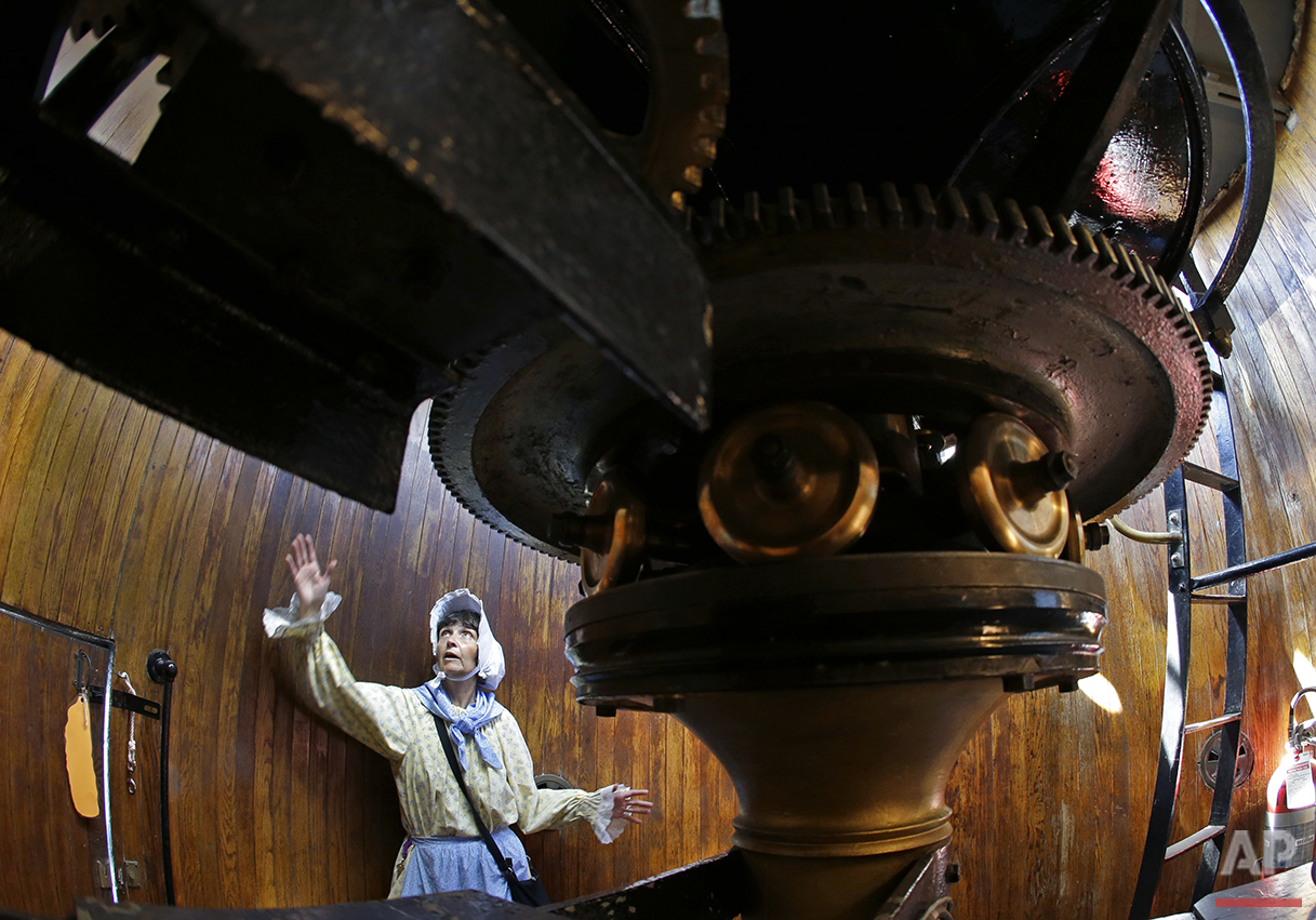  In this Aug. 17, 2016 photo, Sally Snowman, the keeper of Boston Light, gives a tour of the gear room inside the lighthouse on Little Brewster Island in Boston Harbor. (AP Photo/Elise Amendola)&nbsp;See these photos on  APImages.com  